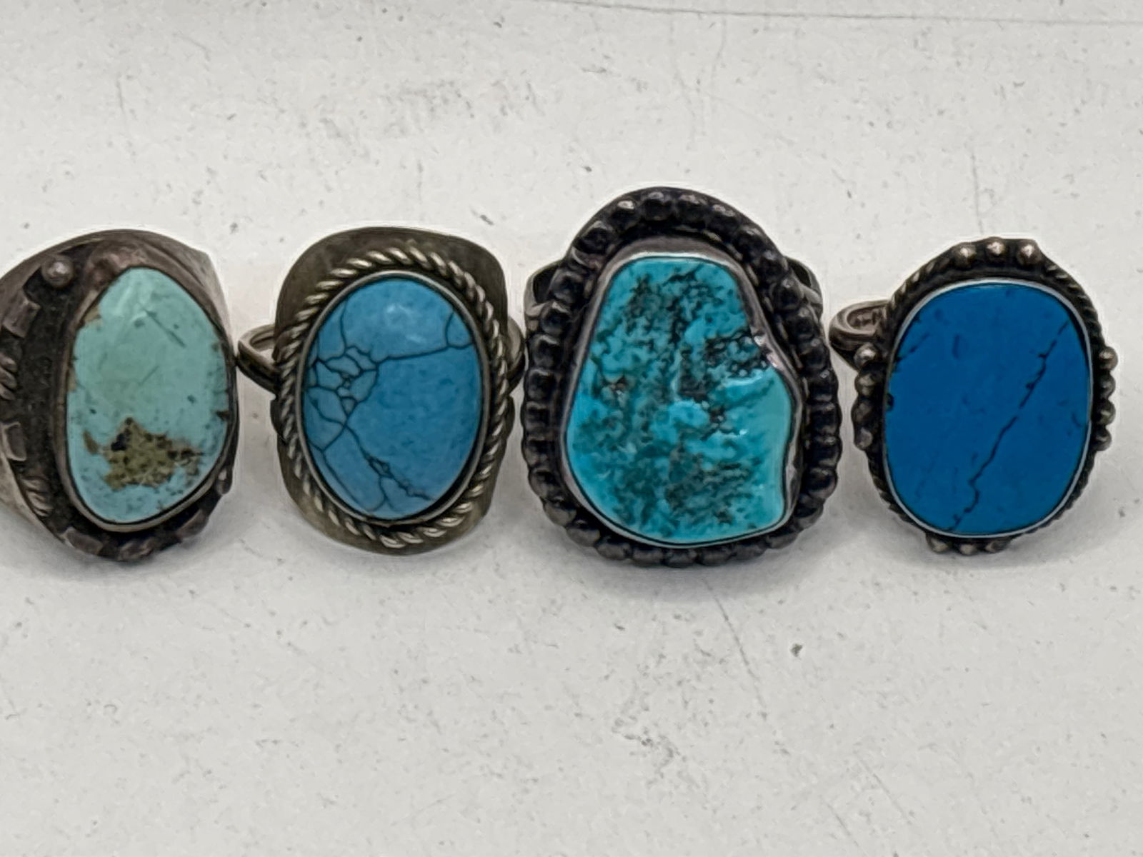 Four vintage Native American sterling silver and turquoise rings; 38 grams (1 of 9)