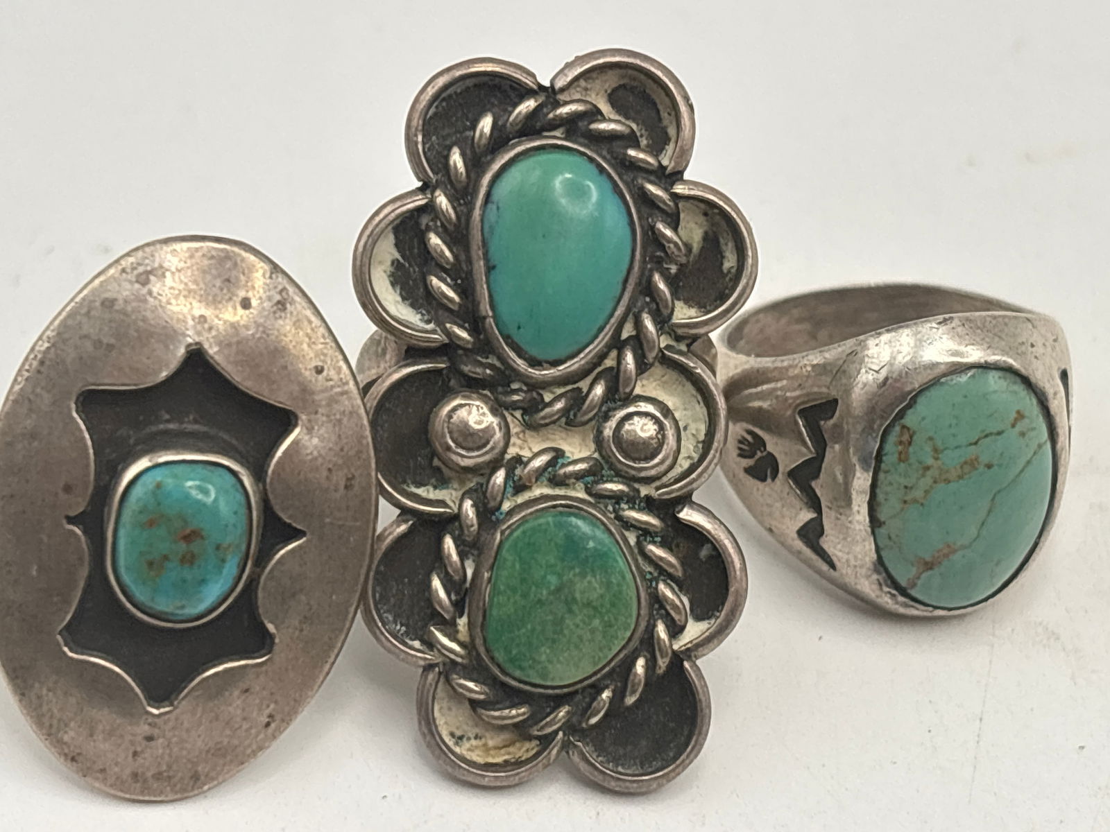 Three Native American turquoise design & sterling silver rings; 31 grams (1 of 10)