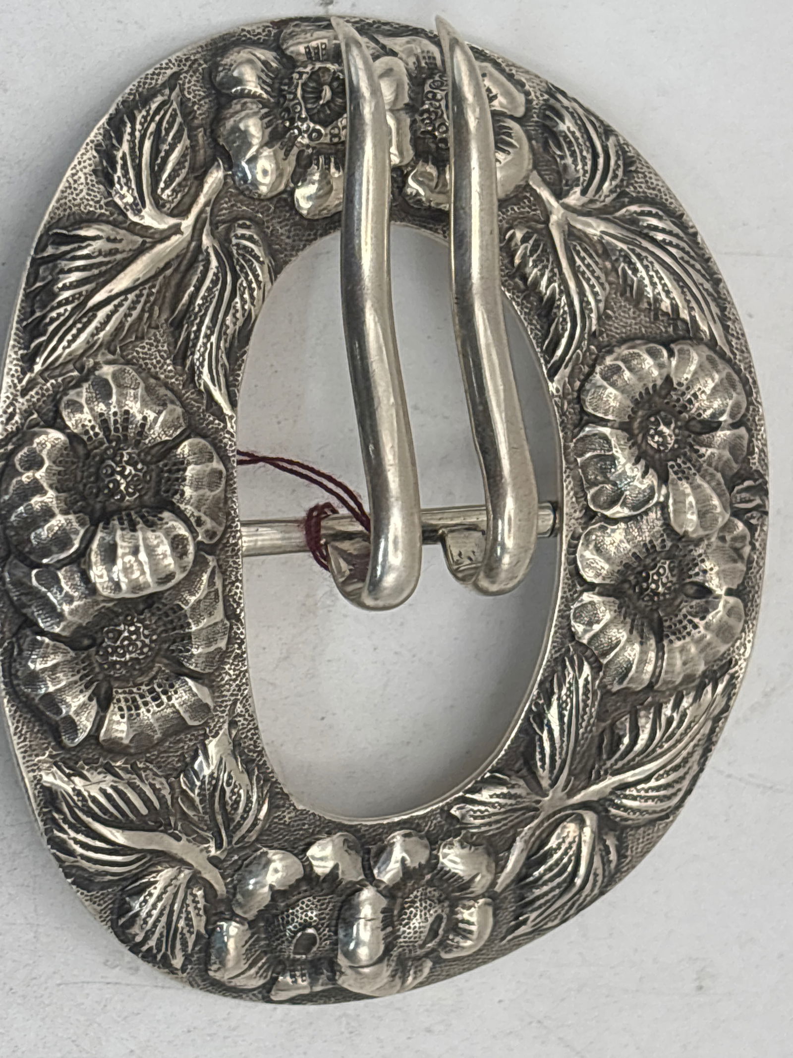 Antique Large Stieff Sterling silver #446 design belt buckle ; 53grams: Antique Large Stieff Sterling silver #446 design belt buckle ; 53grams. It has floral raised relief design . It is 2&3/4 by 3 inches long.
