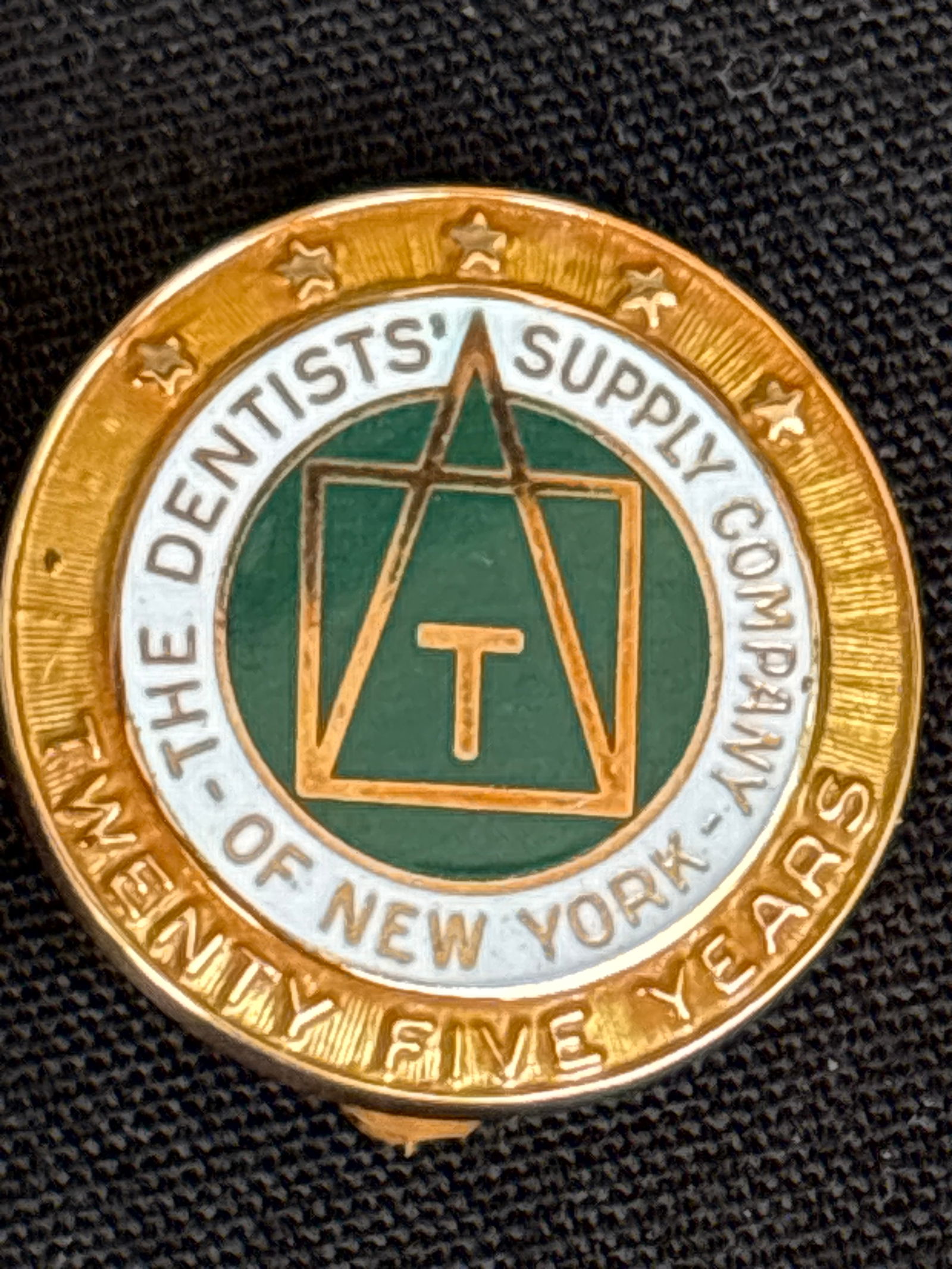 Marked 14 k yellow gold ‘25 years’ 5/8 inch pin; 2.97 grams: Marked 14 k yellow gold ‘25 years’ 5/8 inch pin; 2.97 grams.Circular shoe. Pin for the Dentist’ supply company of New York 25 years.