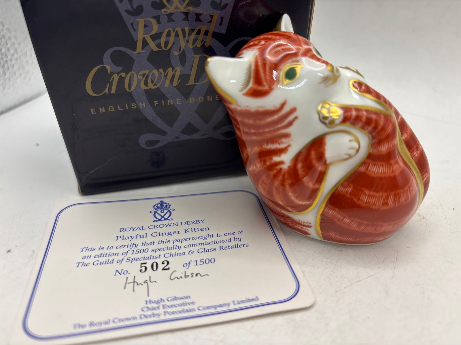 Specially commissioned Playful Ginger Kitten Royal Crown Derby 3&1/2 inch paperweight: With COA, box and gold stopper. Royal Crown Derby Playful Ginger Kitten bone china paperweight.