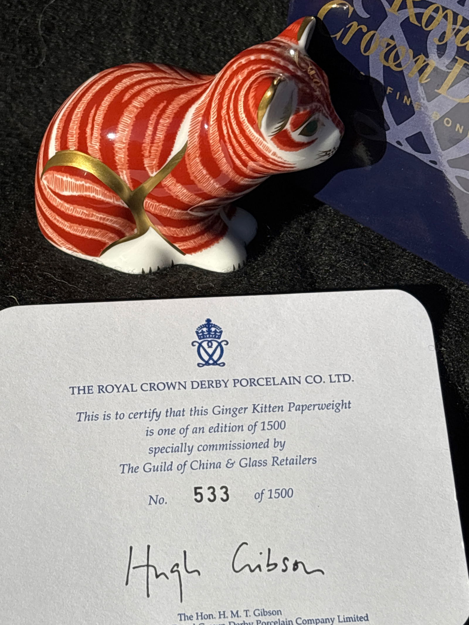 2005 Special editionRoyal Crown Derby ‘Ginger Kitten’ 3 inch paperweight: Gold stopper. With box.Royal Crown Derby "Ginger Kitten” paperweight, known for its distinctive orange/red and white Imari pattern. Stands approximately 5 inches tall.Features a vibrant auburn,
