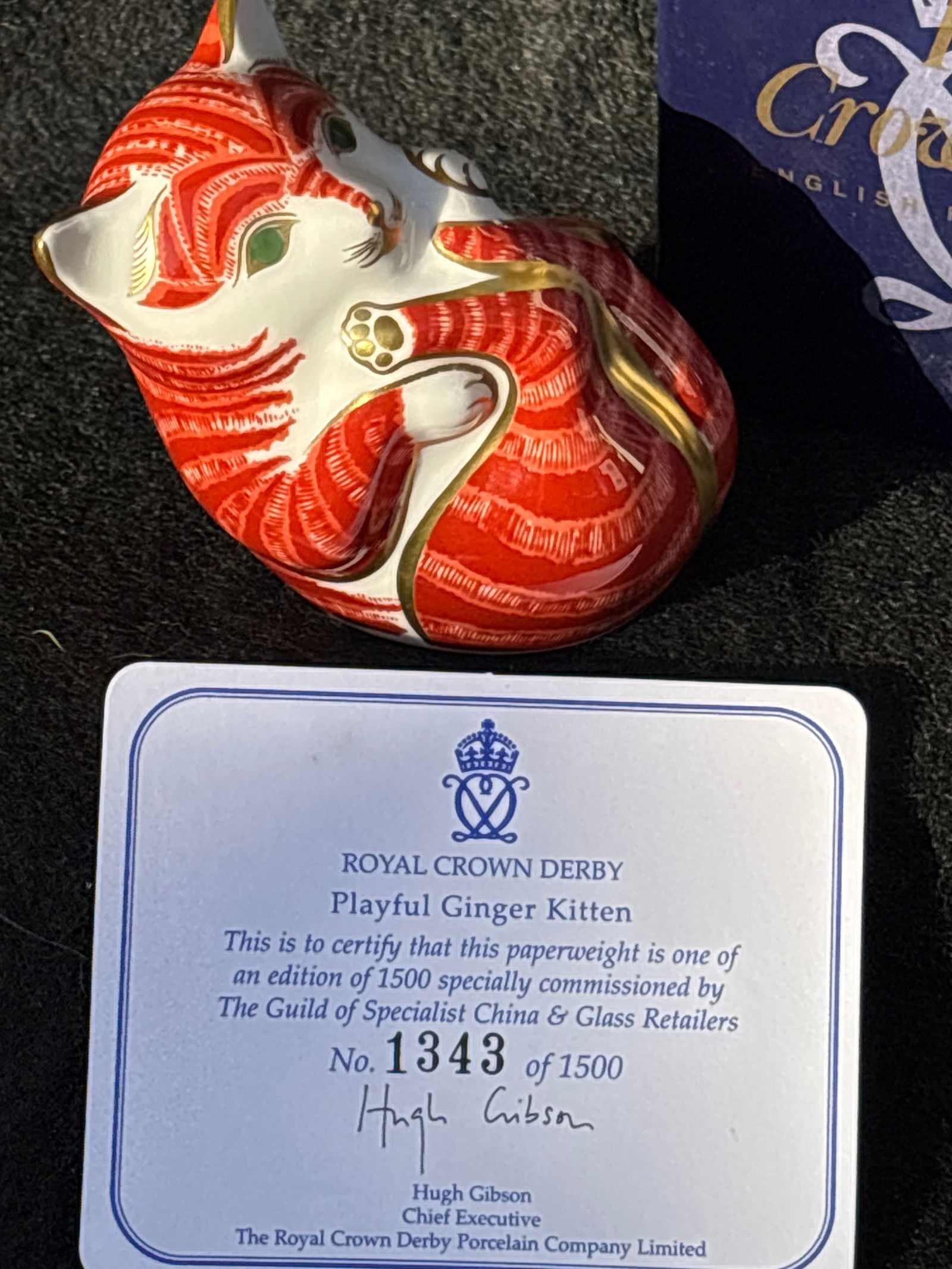 Specially commissioned Royal Crown Derby ‘Playful Ginger Kitten’ 3 inch paperweight: Gold stopper. With box.Royal Crown Derby "Playful Ginger Kitten” paperweight, known for its distinctive orange/red and white Imari pattern. Stands approximately 5 inches tall.Features a vibrant