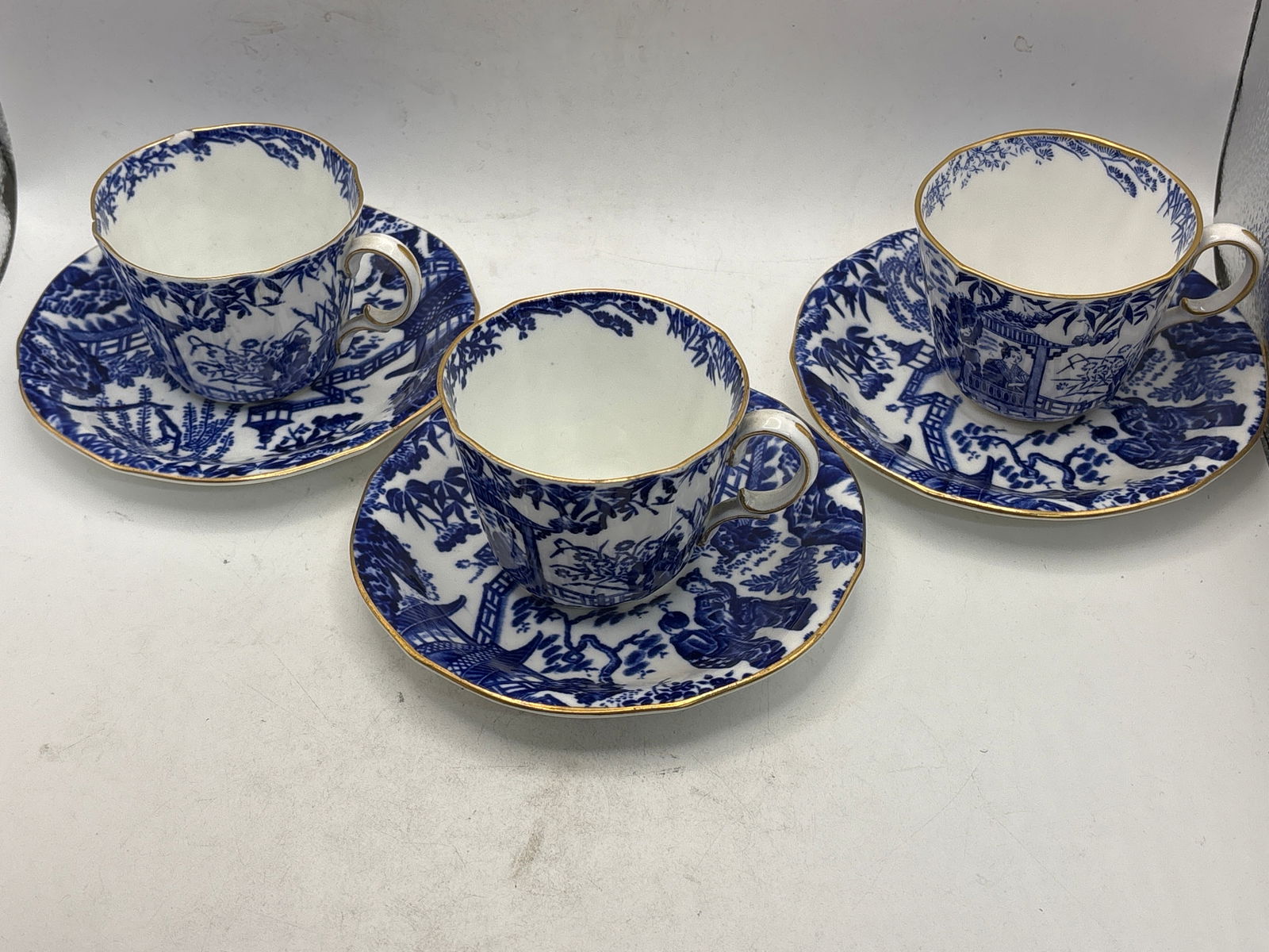 Three blue ‘Mikado’ Royal Crown Derby cups with saucers (1 of 8)