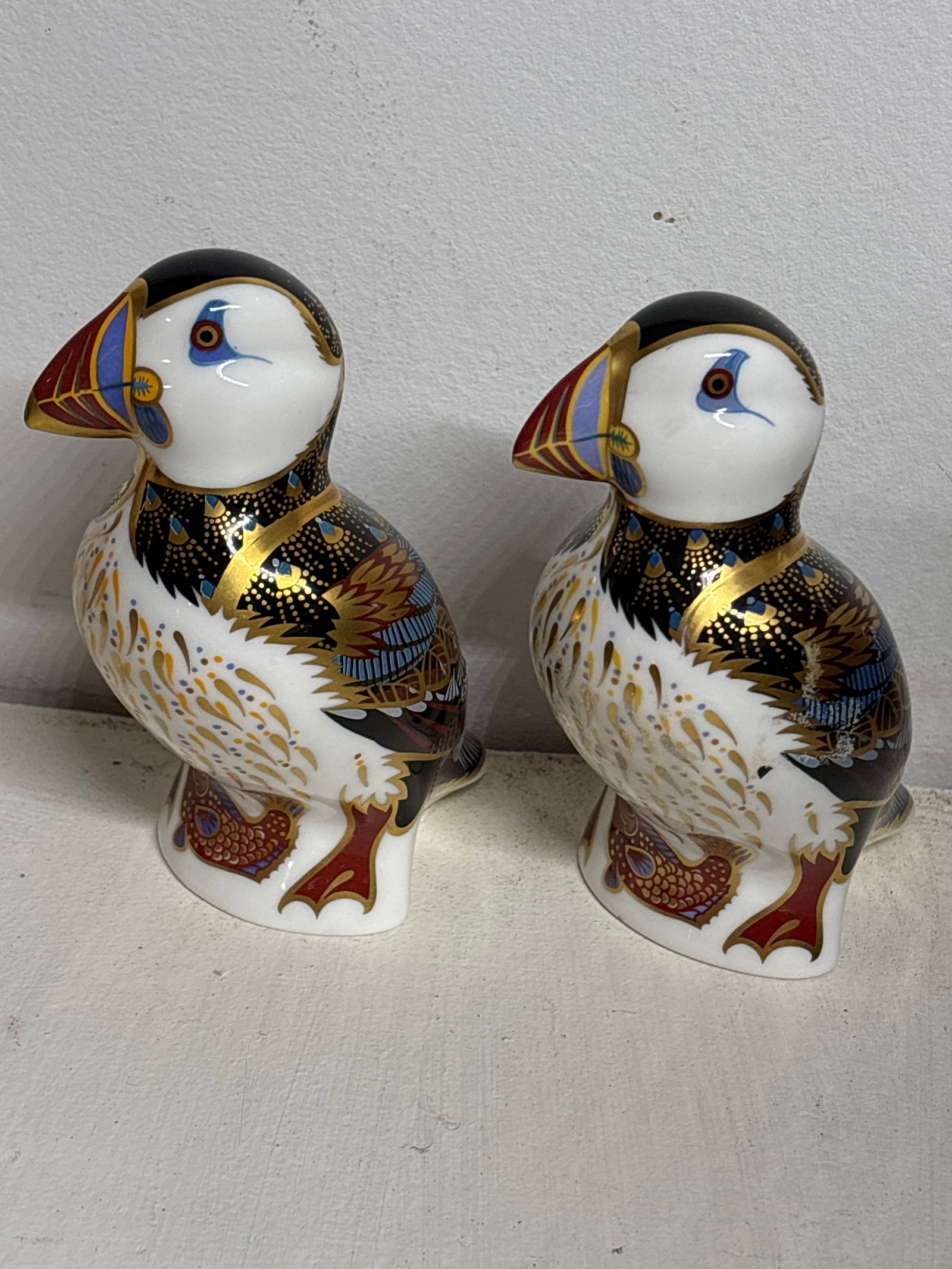 Two Puffin Royal Crown Derby 4 inch paperweights; 1 chip (1 of 5)