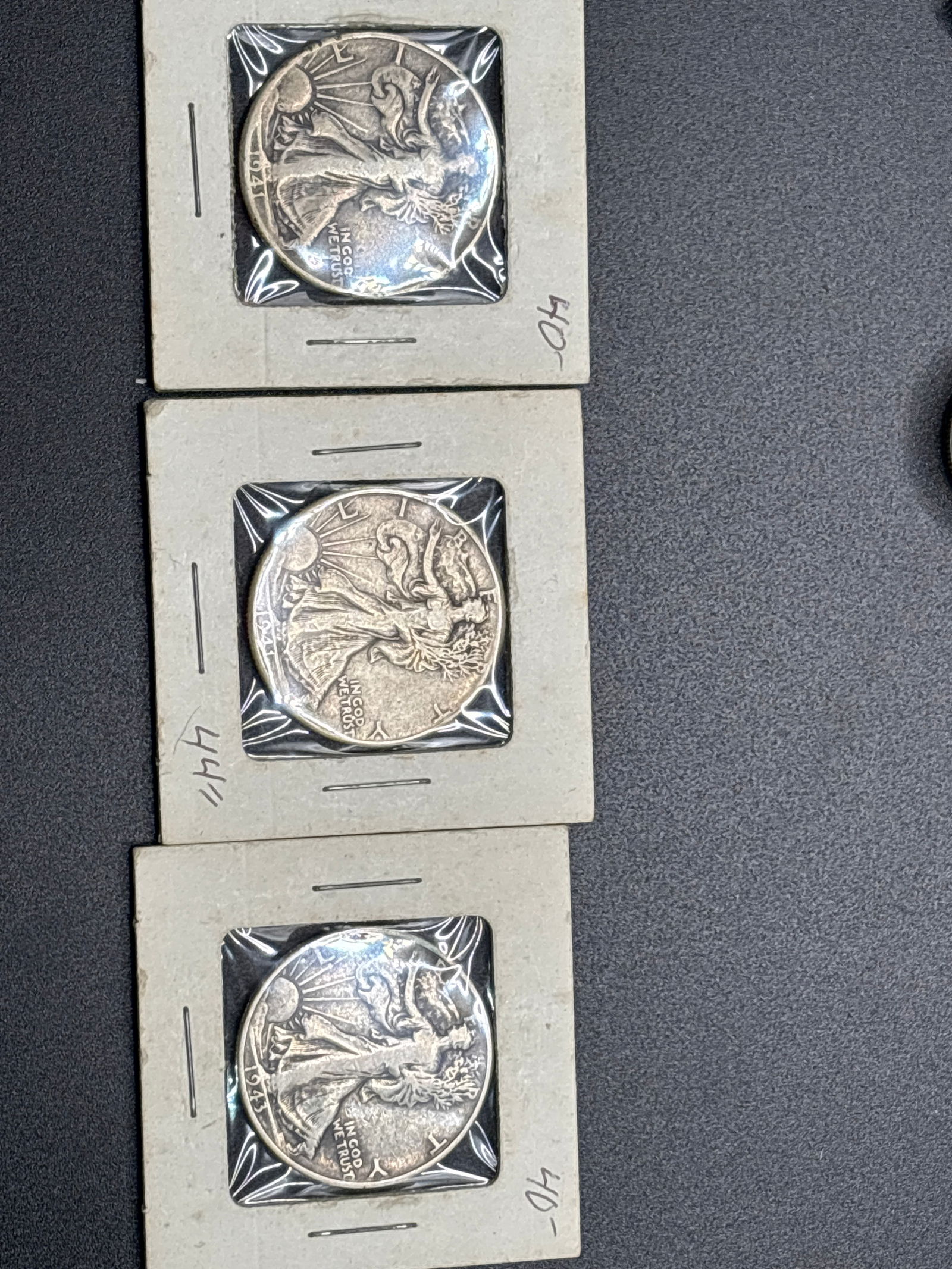 Three WWII era 1940’s Walking Liberty silver half dollars (1 of 7)