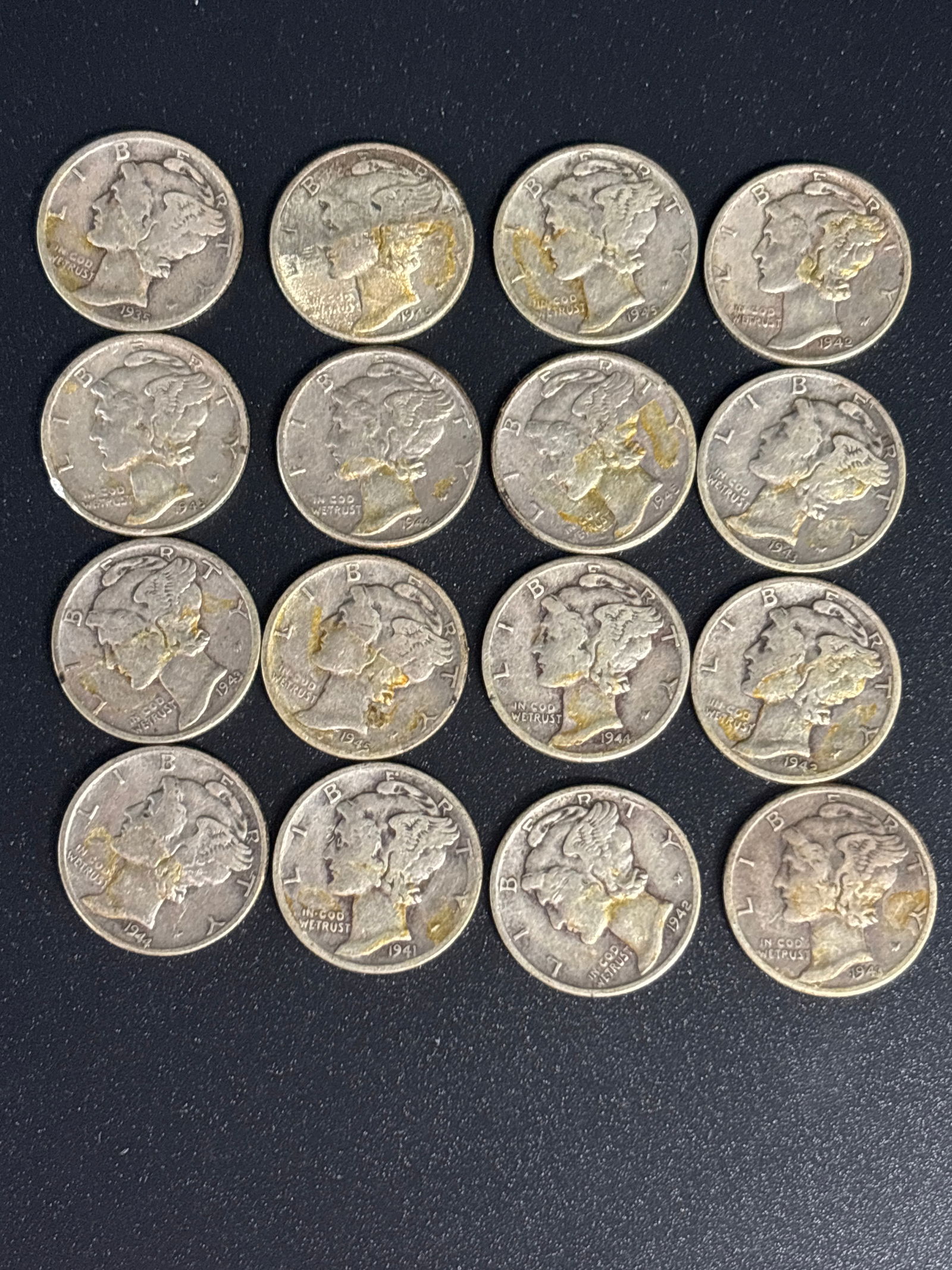 Group of sixteen early Mercury American Silver dimes: sixteen assorted Mercury Dimes. Design: These dimes feature the "Winged Liberty Head" design by Adolph Weinman and were produced by the U.S. Mint from 1916 to 1945. Composition: They are composed of