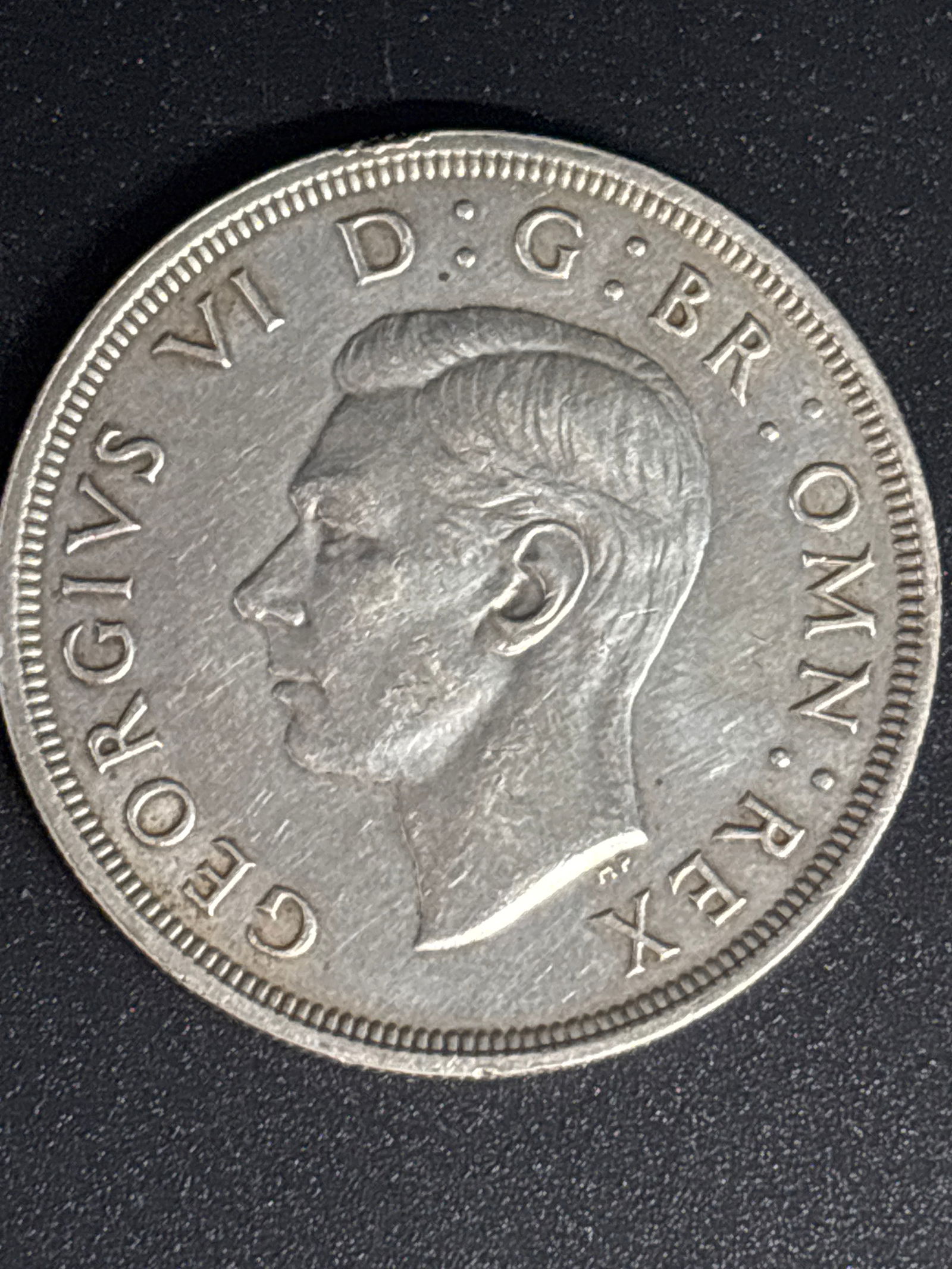Pre WWII era 1937 Great Britain King George VI Coronation Silver Crown coin: 1937 Great Britain King George VI Coronation Silver Crown coin. Composition: Struck in solid .500 silver, containing 50% silver, 40% copper, 5% nickel, and 5% zinc. Design: The reverse features a