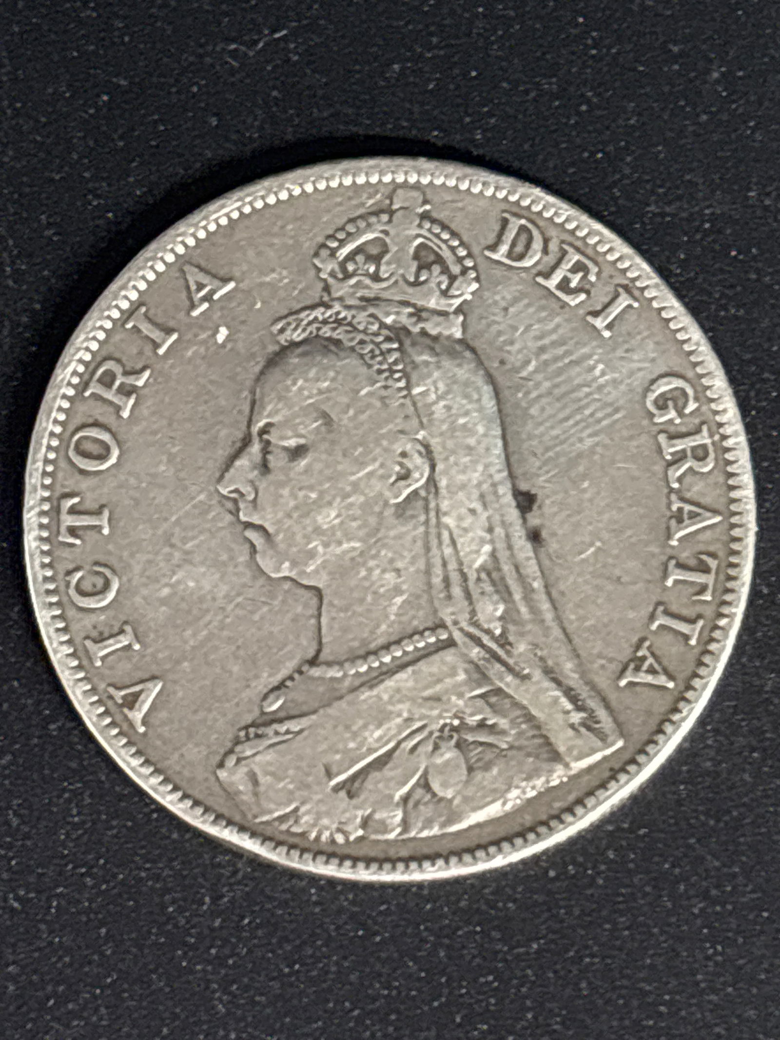 Rare 1890 Victoria Silver Double Florin from the United Kingdom: 1890 Victoria Silver Double Florin from the United Kingdom. It is a collectible coin issued to celebrate Queen Victoria's Golden Jubilee. Denomination: 4 Shillings (a "Double Florin"). Composition: