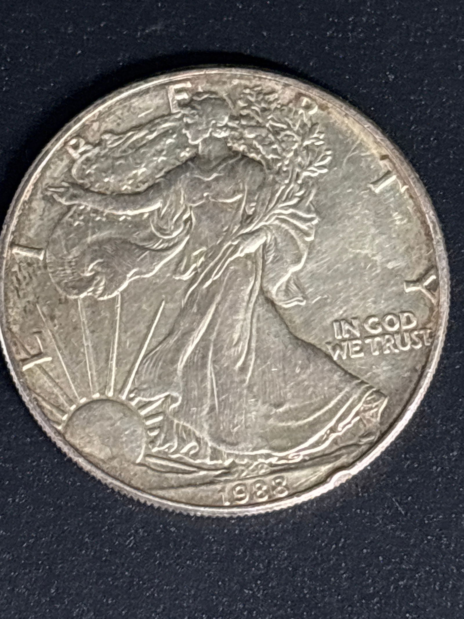 .999 fine 1983 American Silver Eagle dollar 1 Troy Ounce coin: 1983 American Silver Eagle dollar 1 Troy Ounce coin. Material: Contains 1 troy ounce of fine silver. Design: Features Adolph A. Weinman's iconic "Walking Liberty" design on the obverse, originally use