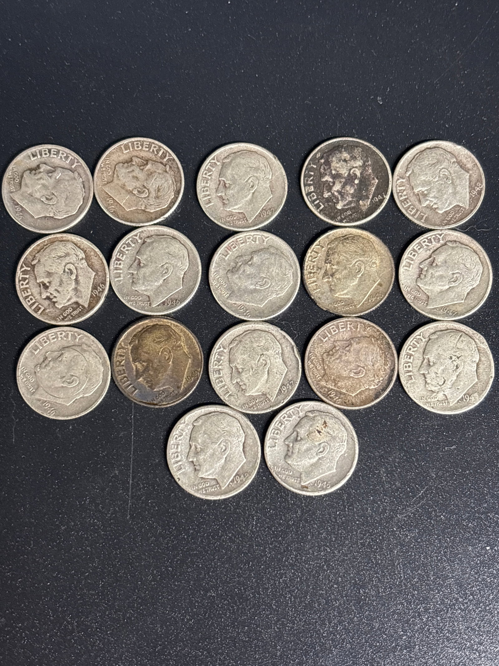 Group of seventeen early 1940’s United States Roosevelt Dimes.: Group of seventeen early 1940’s United States Roosevelt Dimes. Composition: This coin is composed of 90% silver and 10% copper, minted prior to the 1965 transition to base metal. Design: It features