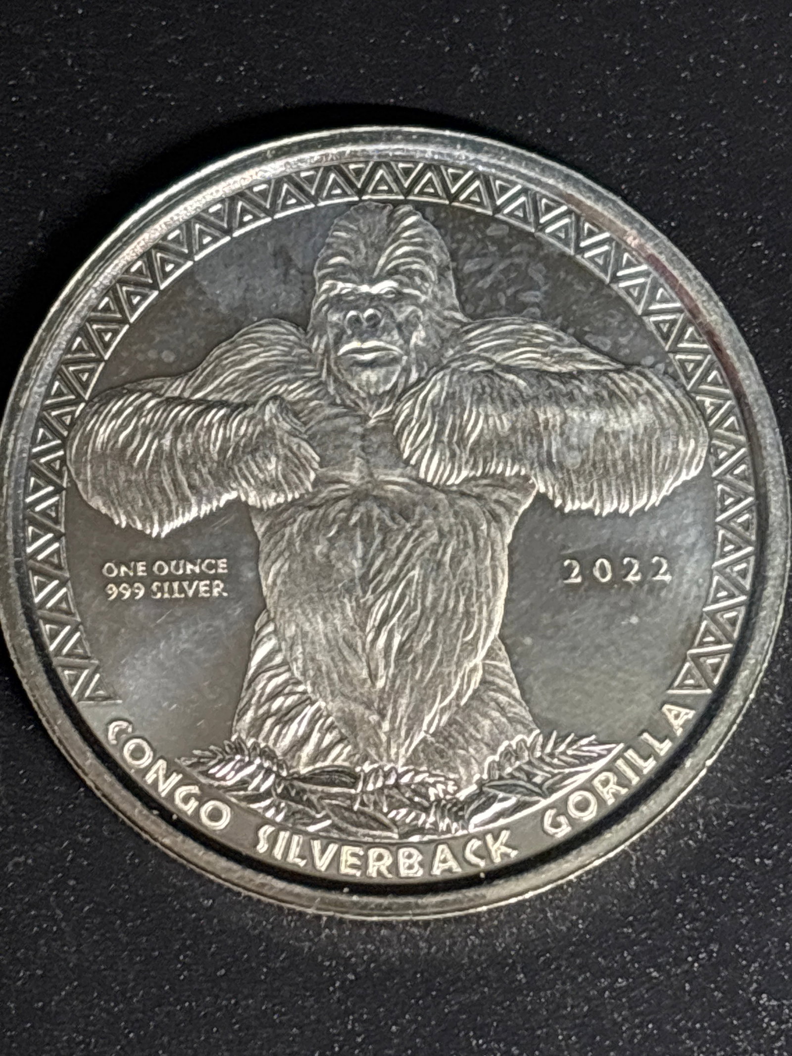 one ounce .999 fine silver 2022 Republic of the Congo Silverback Gorilla coin: 2022 Republic of the Congo Silverback Gorilla 1 oz Silver Coin. Composition: Contains one troy ounce of .999 fine silver.Design: Features a detailed depiction of a silverback gorilla pounding its ches