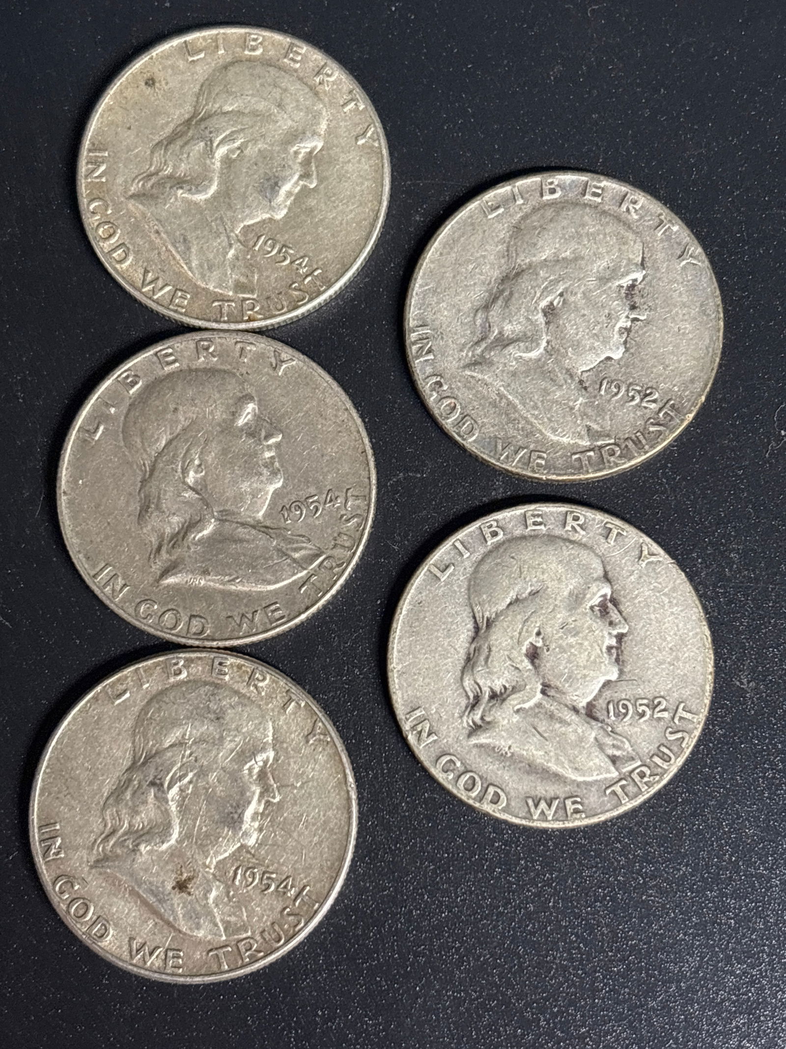 Five 1950’s Franklin Half Dollars silver fifty-cent pieces (1 of 4)