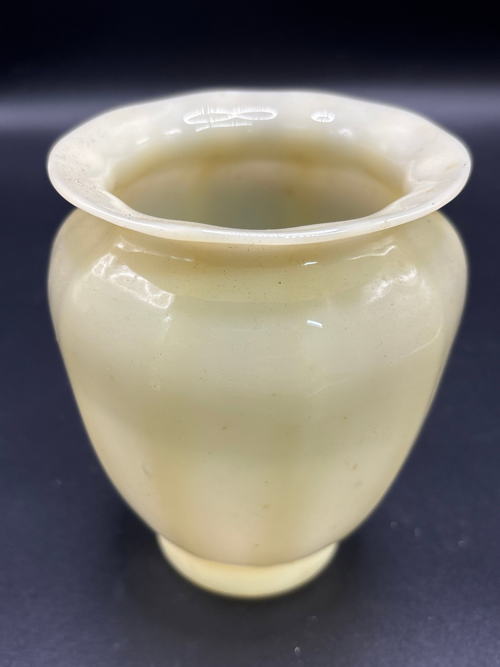 Antique Steuben Ivory Jade glass 5 inch vase; Carder design: Steuben Ivory Jade glass vase, a popular product developed by Frederick Carder for the Steuben Glass Company in the 1920s. Material: Ivory Jade is a warm, cream-colored translucent art glass. Design: