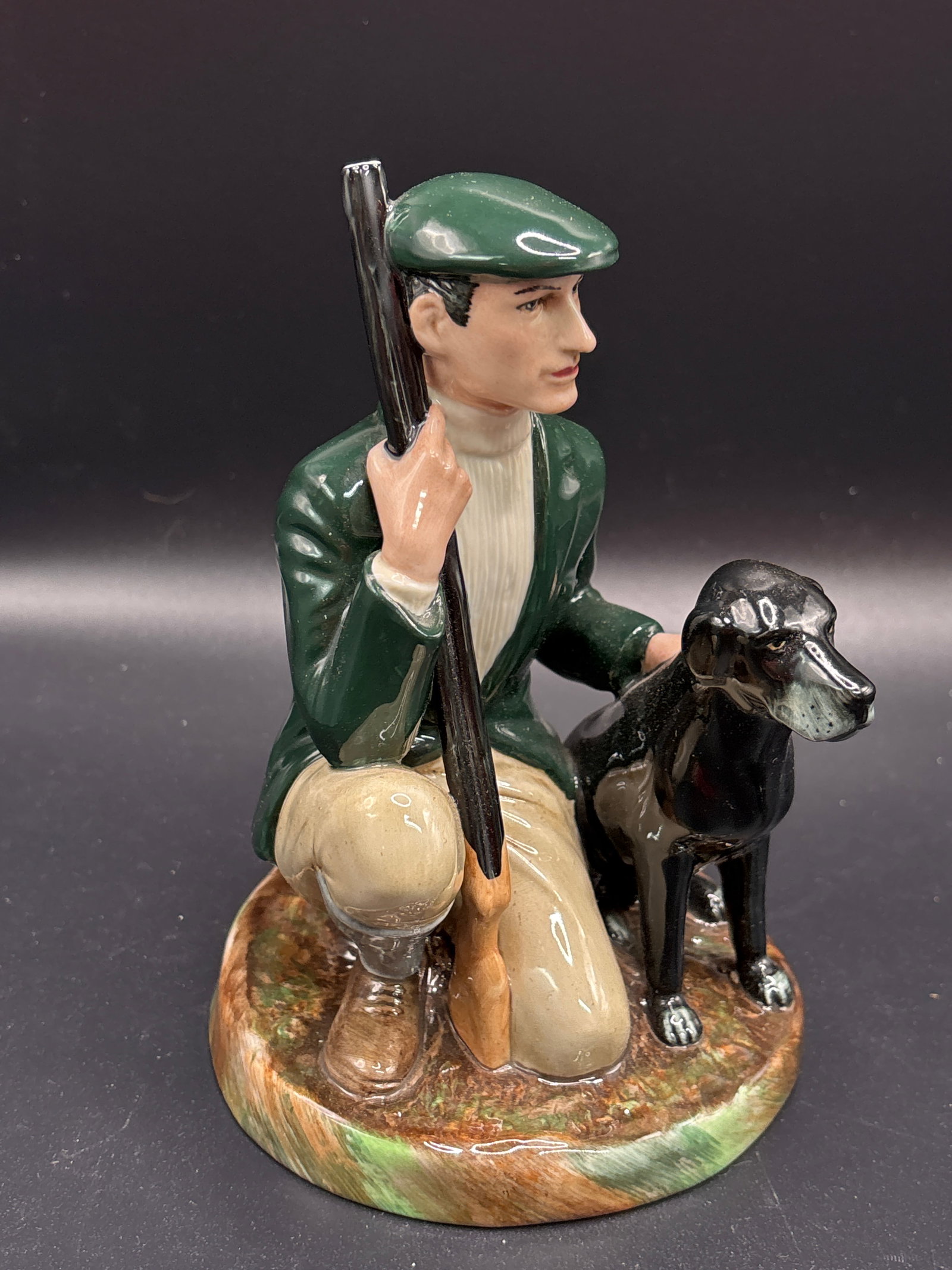 Desireable Royal Doulton figurine titled "The Gamekeeper," specifically model number HN2879: Desireable Royal Doulton figurine titled "The Gamekeeper," specifically model number HN2879. Designer: Designed by Eric J. Griffiths. Production: Issued between 1984 and 1992, made in England of bone