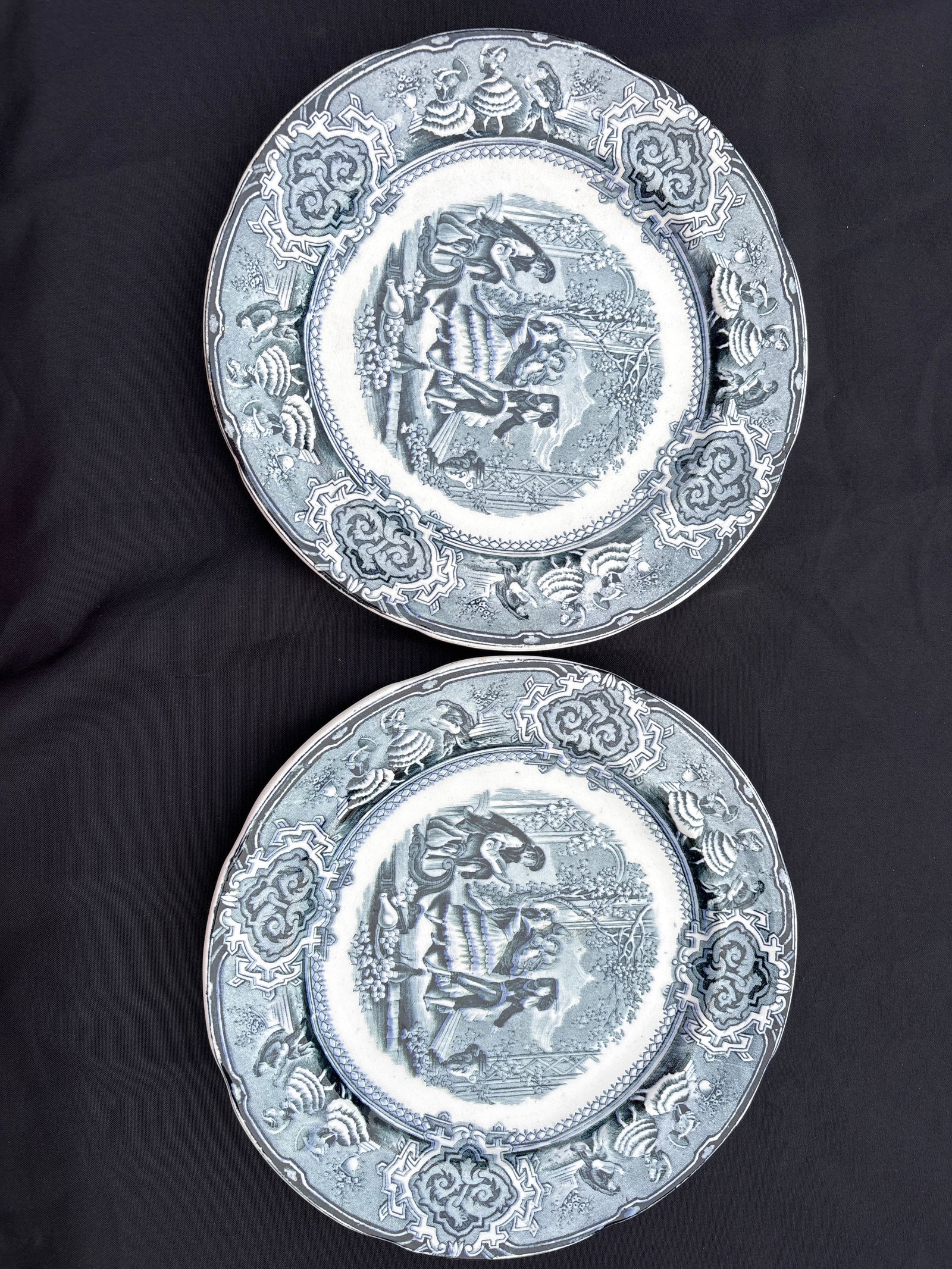 Pair Vintage Flow Blue Transferware Plates featuring a scene of dancers (1 of 8)