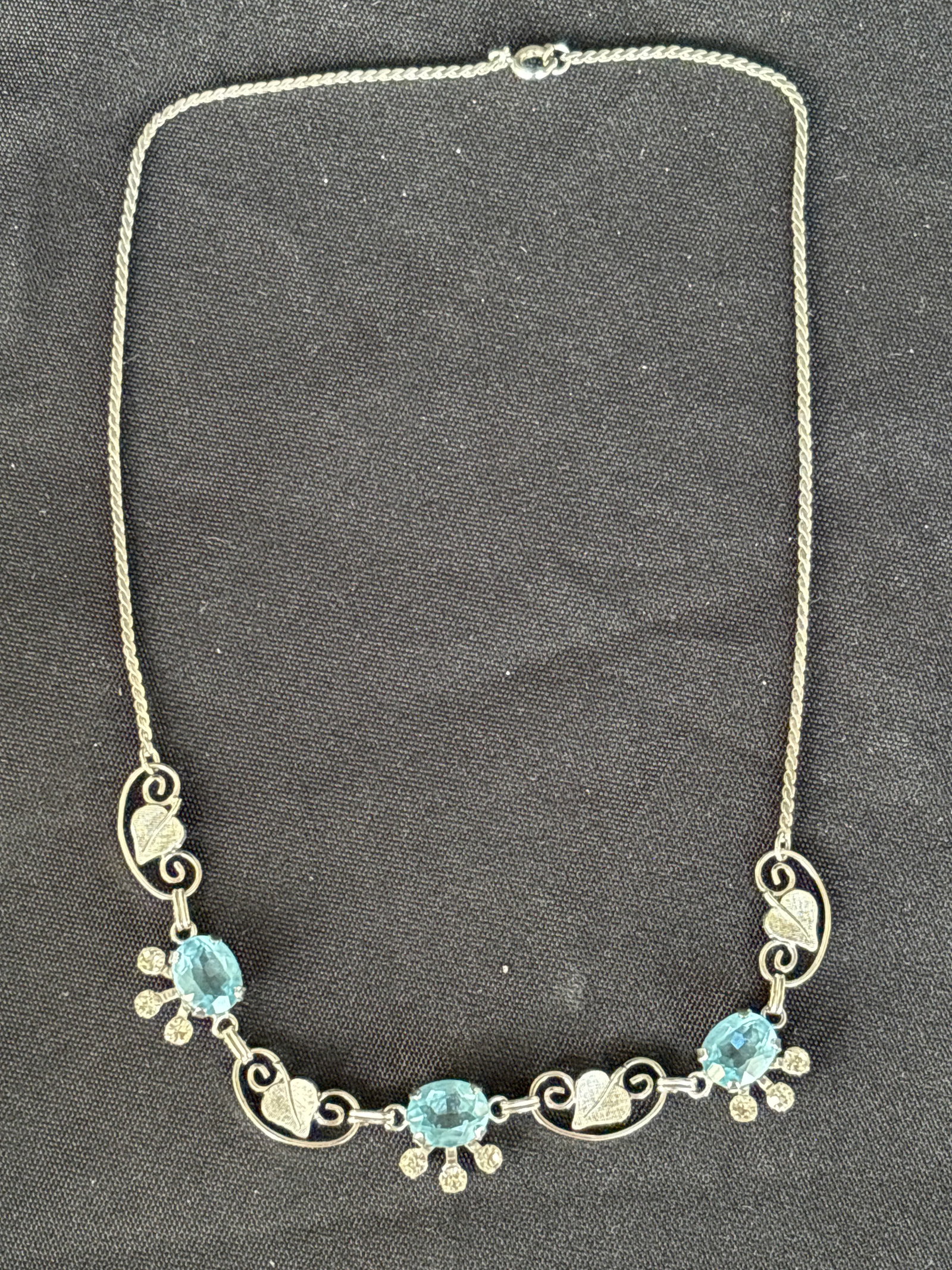 Sort 14 inch sterling silver necklace features delicate links with blue topaz; 11grams (1 of 7)