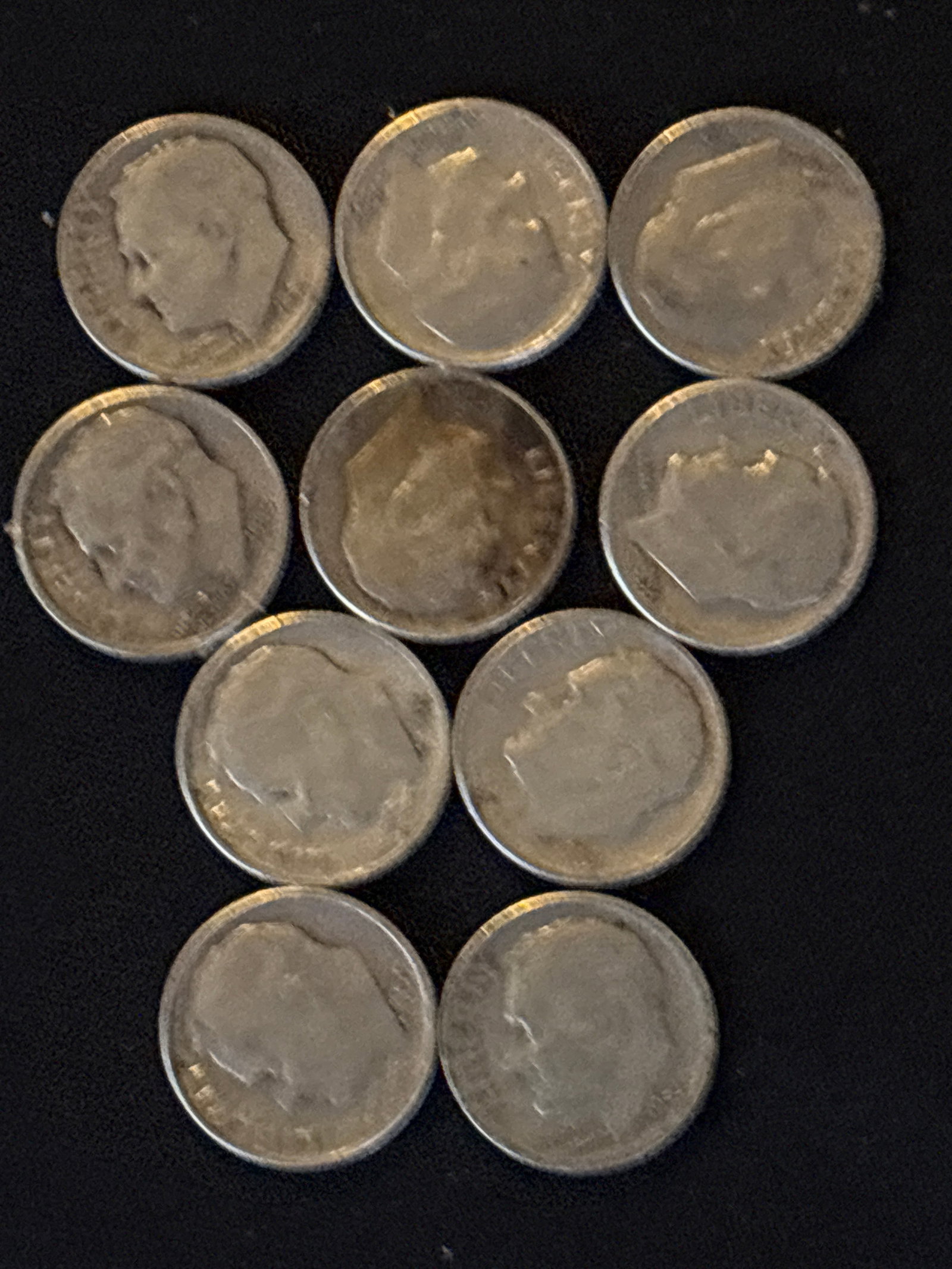 Ten 90% silver 1950’s United States Roosevelt dimes (1 of 5)