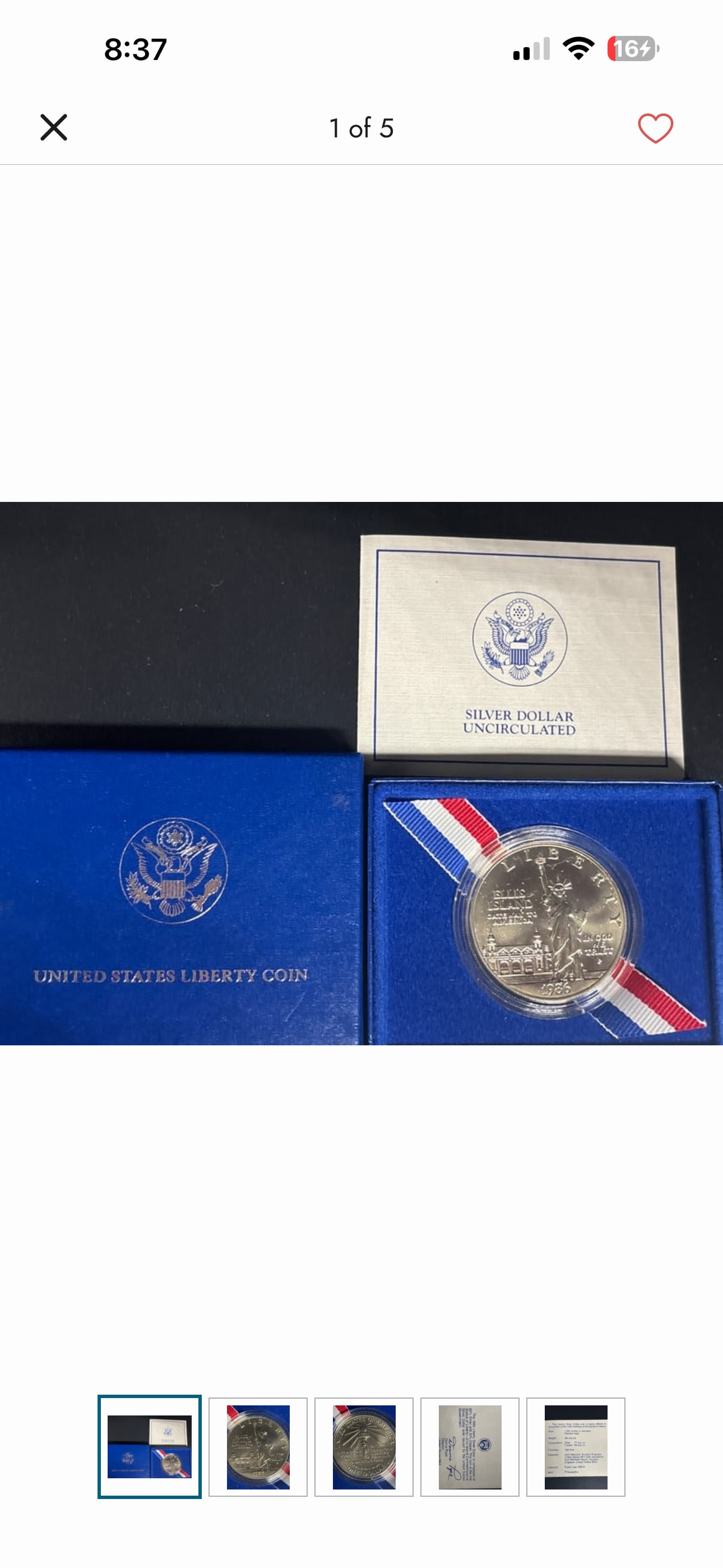 .77 ounce 90% silver 1986 Statue of Liberty Commemorative Silver Dollar: 1986 Statue of Liberty Commemorative Silver Dollar, marking the centennial of the Statue of Liberty. Composition: It is made of 90% silver and 10% copper, containing 0.77 troy oz of silver. Design: