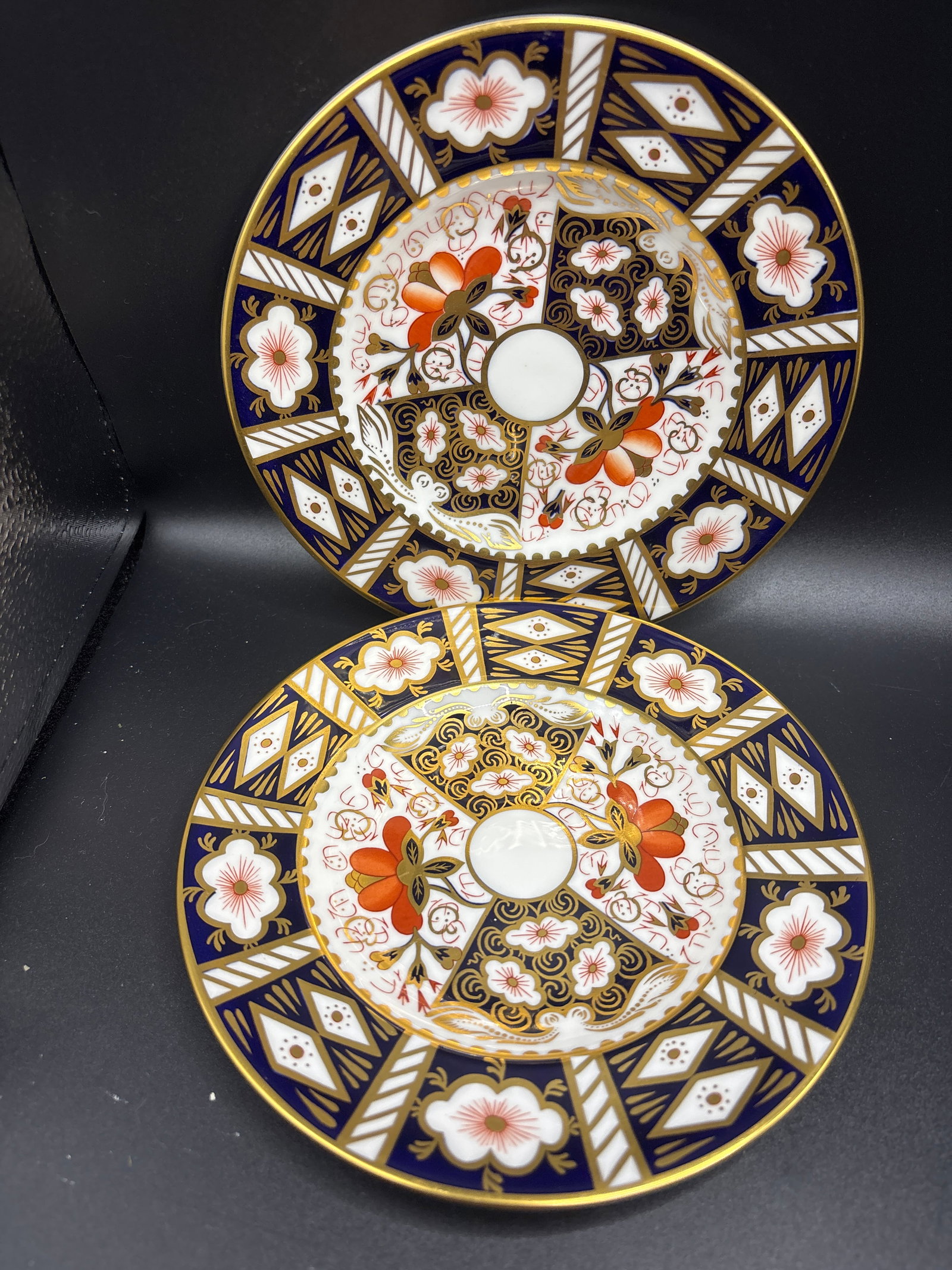 pair 6&3/8 inch Royal Crown Derby plates Traditional Imari’ #2451: pair 6&3/8 inch Royal Crown Derby plates in the "Traditional Imari" (pattern number 2451) design. This pattern is known for its intricate hand-painted motifs in a palette of cobalt blue, vivid iron