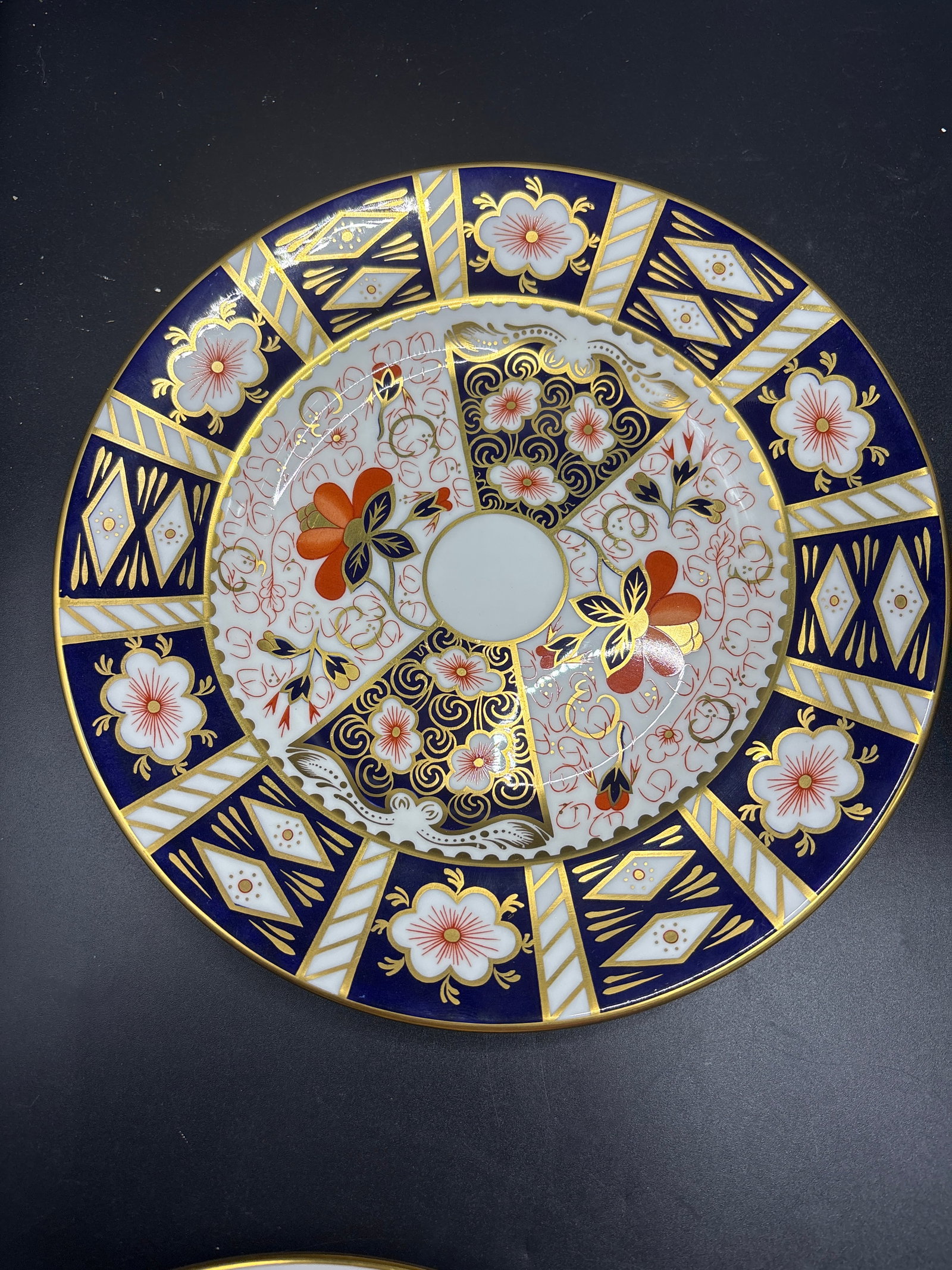 8&1/2 inch Royal Crown Derby plates Traditional Imari’ #2451: 8&1/2 inch Royal Crown Derby plates in the "Traditional Imari" (pattern number 2451) design. This pattern is known for its intricate hand-painted motifs in a palette of cobalt blue, vivid iron red