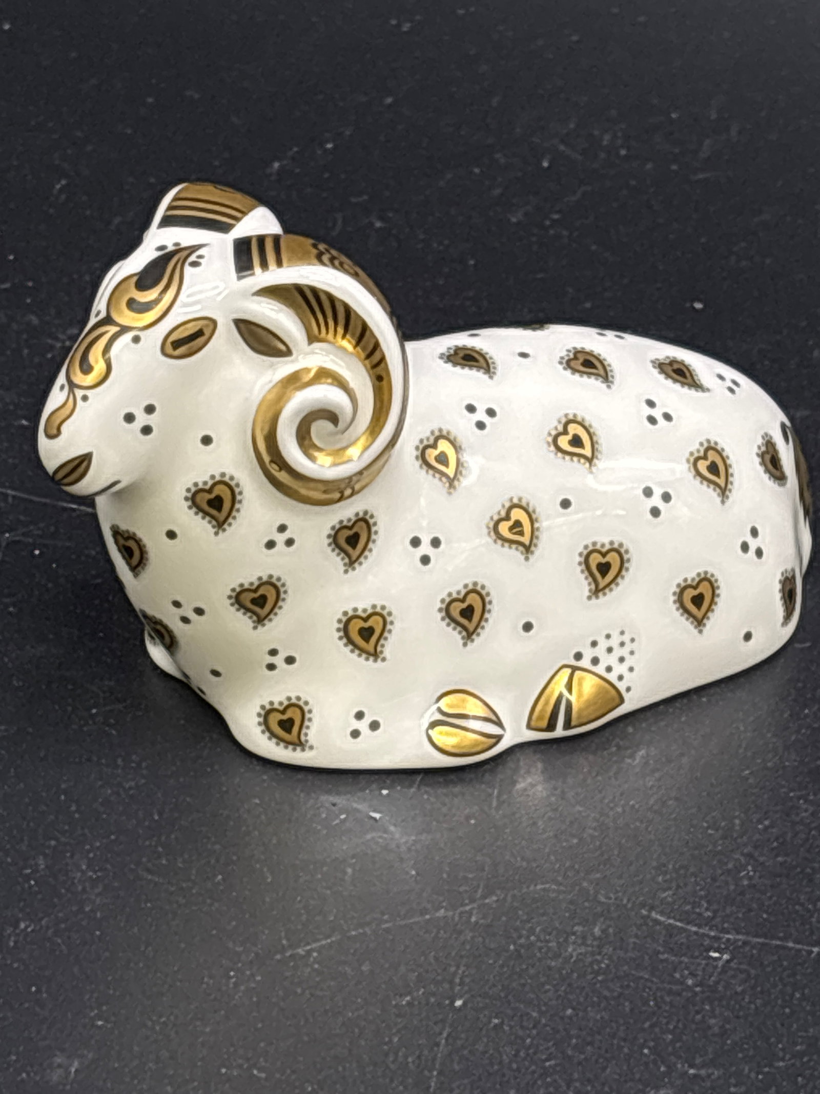2011 Imari ‘Derby City Ram’ Royal Crown Derby bone china 3&1/2 inch paperweight: First Quality. Gold stopper. No box. Royal Crown Derby City Ram paperweight featuring a white porcelain body with blue and gold Imari-style patterns.Design Details: The figurine features intricate gol
