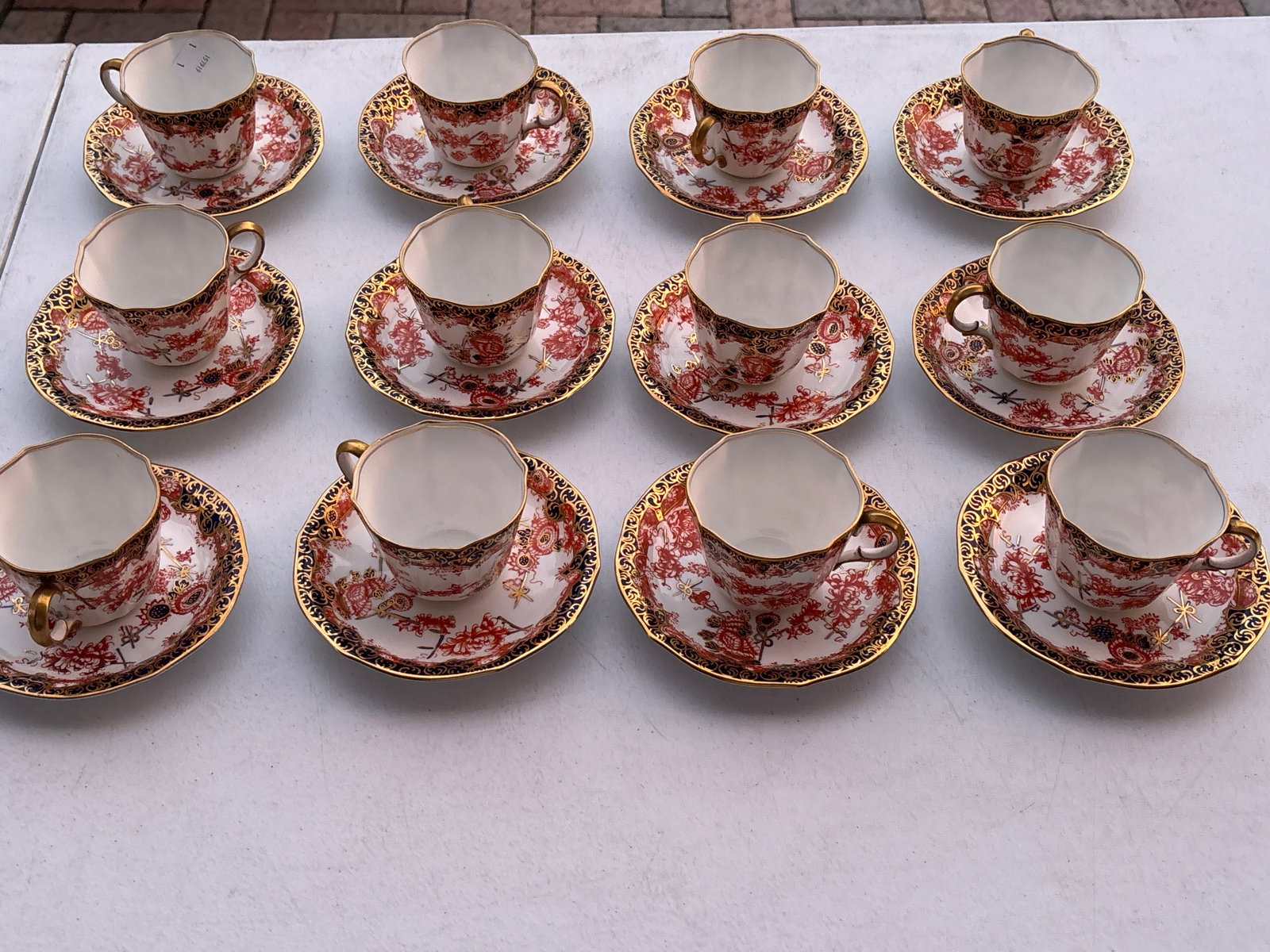 Rare set of twelve vintage Royal Crown Derby ‘Melton’ pattern #2649 cups with saucers: Rare set of twelve vintage Royal Crown Derby Imari porcelain cups 2&3/4 & saucers 5&1/2 inches in the "Melton" pattern (pattern 2649), featuring intricate floral designs in rust red and gold on a coba