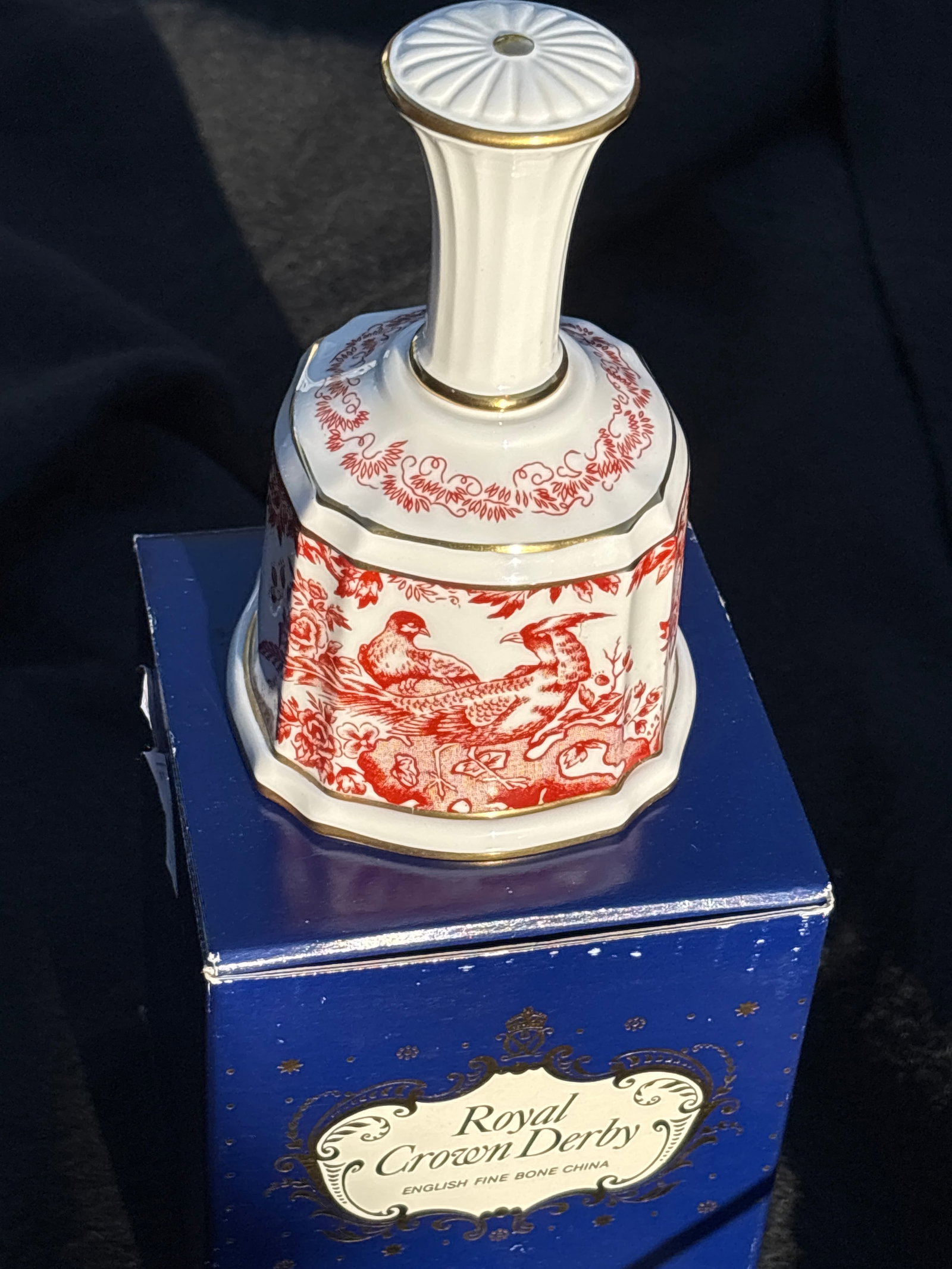 Large 6 inch vintage Royal Crown Derby bone china bell in the Red Aves pattern: Large 6 inch vintage Royal Crown Derby bone china bell in the Red Aves pattern.The item is crafted in England and features a detailed transferware design of red pheasants amid foliage.It is adorned wi