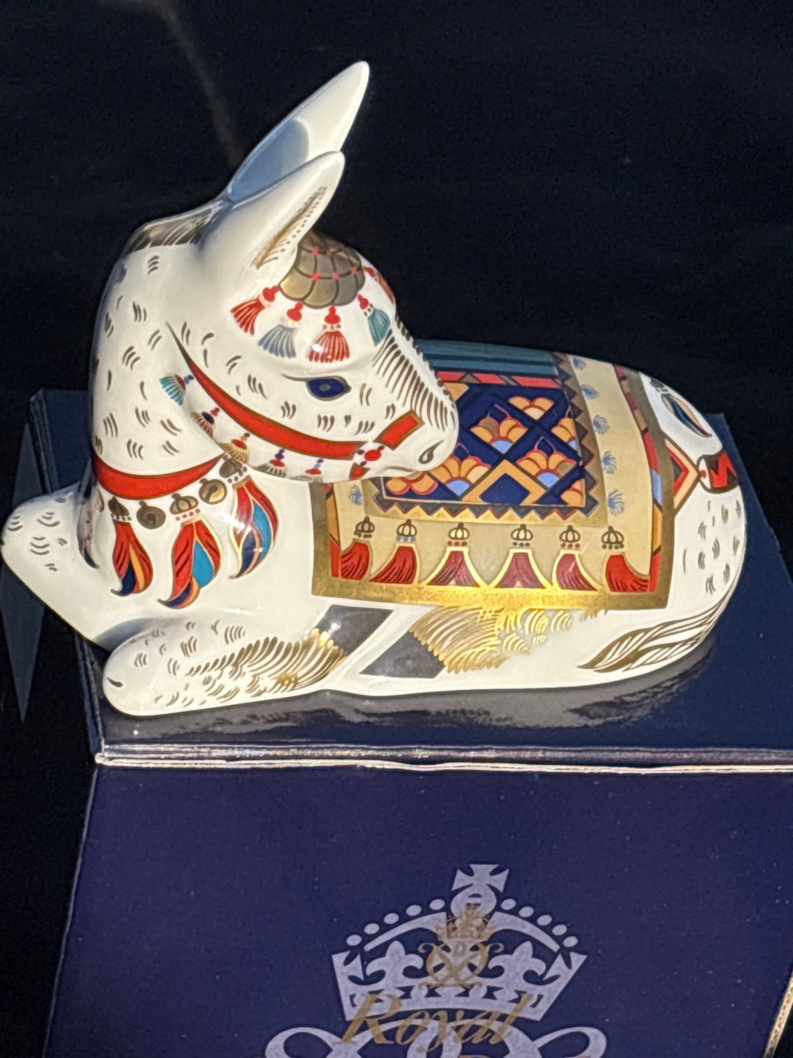 Large 6 inch Royal Crown Derby "Thistle" donkey paperweight: Royal Crown Derby "Thistle" donkey paperweight adorned with 22-carat gold gilding and featuring a gold stopper. It was introduced in 2001 and retired in 2006, though a limited signature edition of