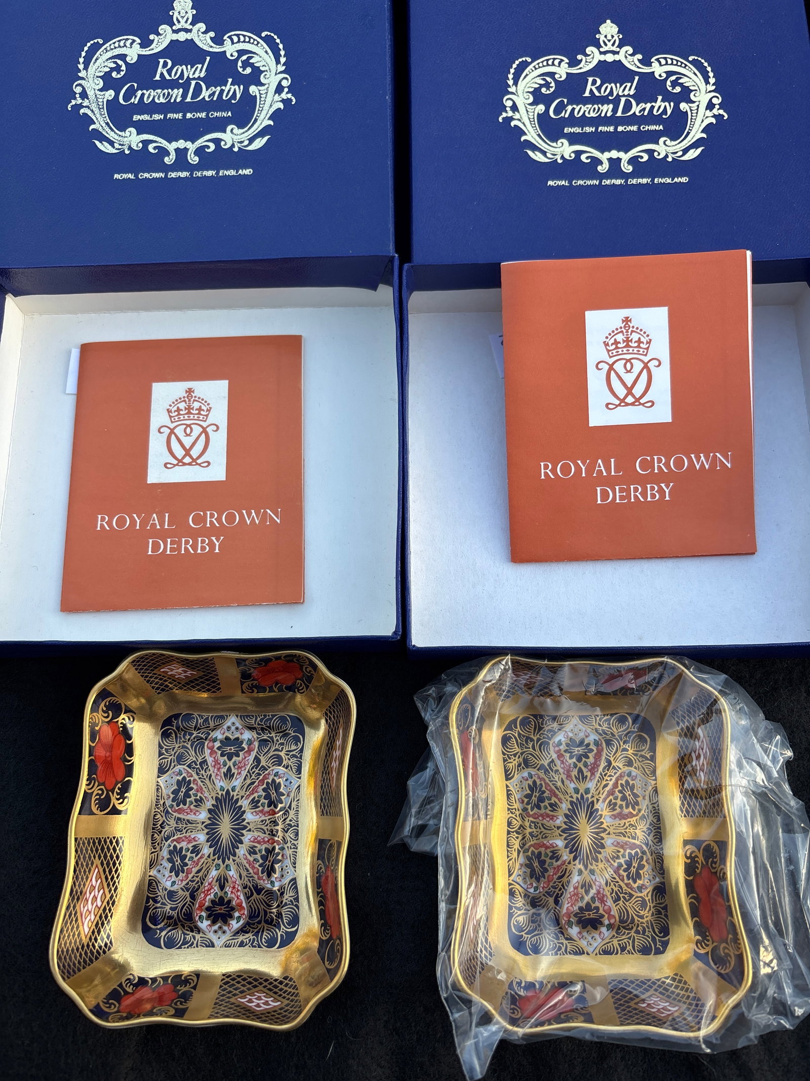 Pair Gold band Royal Crown Derby "Old Imari#1128 3.75 inch trinket dishes: Royal Crown Derby Old Imari 1128 trinket or pin dish. It is crafted from fine bone china in England and features hand-decorated cobalt blue, iron red, and 22-carat gold floral and geometric patterns.P