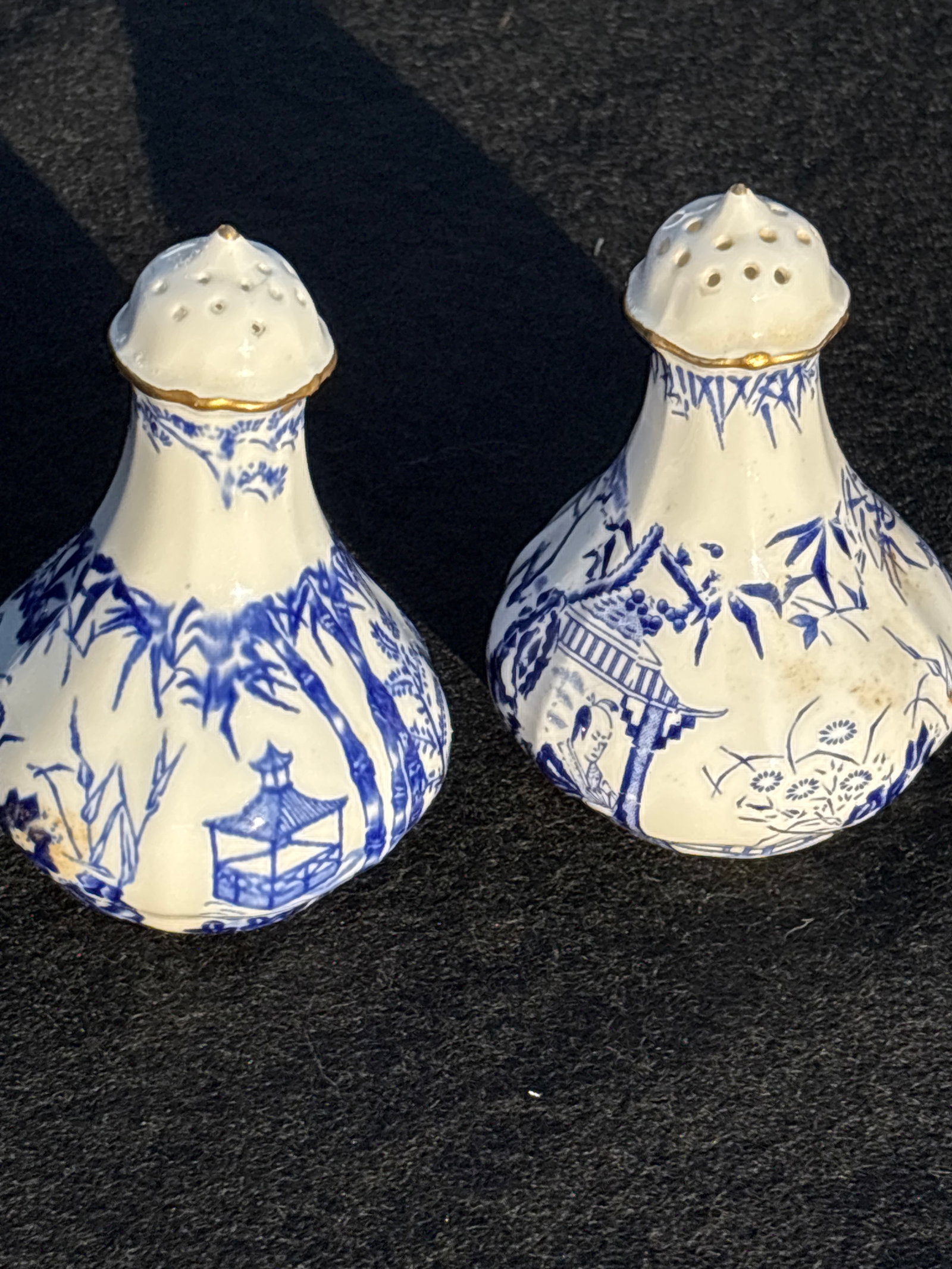 pair shakers Royal Crown Derby in the popular "Mikado" pattern: 8 inch: Royal Crown Derby in the popular "Mikado" pattern. This classic design features a blue transferware scene of pagodas, bamboo, and bridges, inspired by traditional Japanese art. &1/4. Key Identificatio