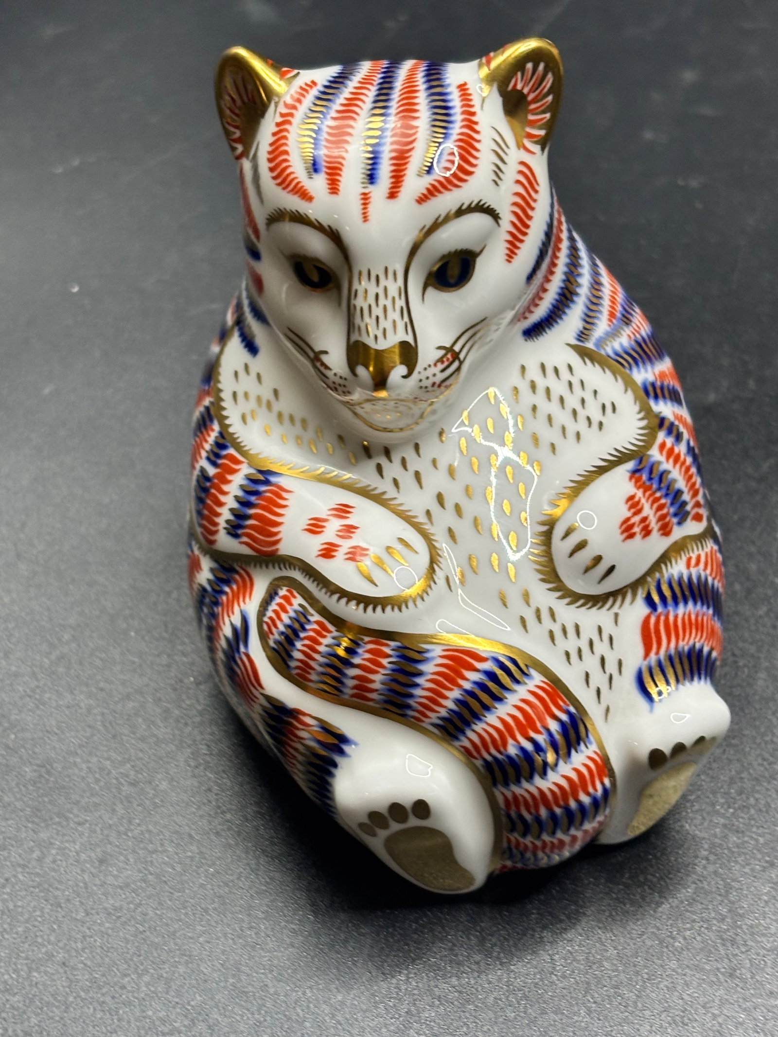 Imari to get cub Royal Crown Derby bone china 3 inch paperweight: silver stopper. seconds. no box. Royal Crown Derby Tiger Cub paperweight in the traditional Imari pattern.* This porcelain figurine was designed by Jo Ledger and modeled by Robert Jefferson.* It featu