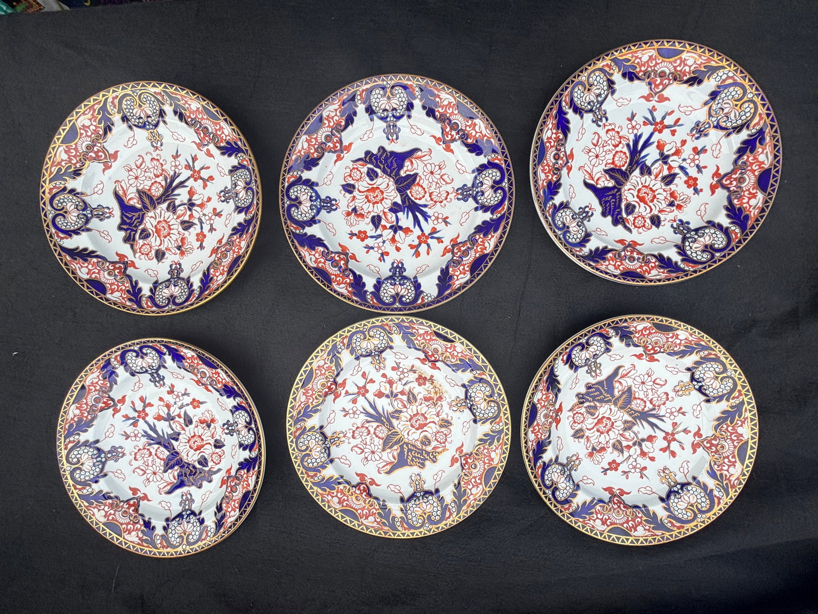 Smooth edge Antique set of six Kings Imari (Pattern No. 383) Royal Crown Derby porcelain plates: Antique set of six Royal Crown Derby "Kings" pattern piece, a classic example of Imari-style bone china characterized by its intricate floral designs in cobalt blue, rust/iron red, and heavy gold gild