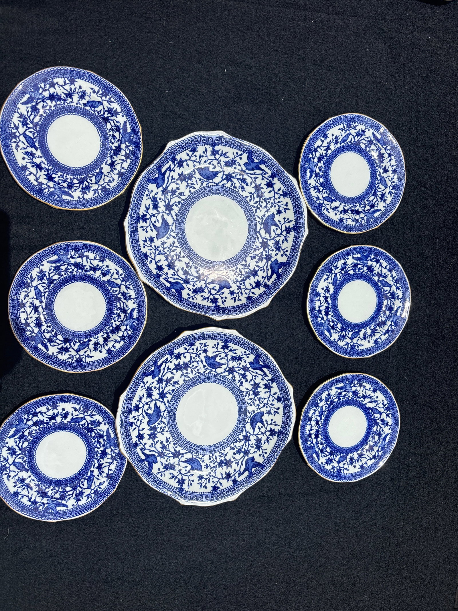 Eight Royal Crown Derby porcelain Pembroke pattern dessert set: Royal Crown Derby porcelain in the Pembroke pattern (specifically the Blue Pembroke or Pembroke Blue variation). Key Features of the PlatePattern Name: Pembroke.Design: A Chinoiserie-style pattern fea
