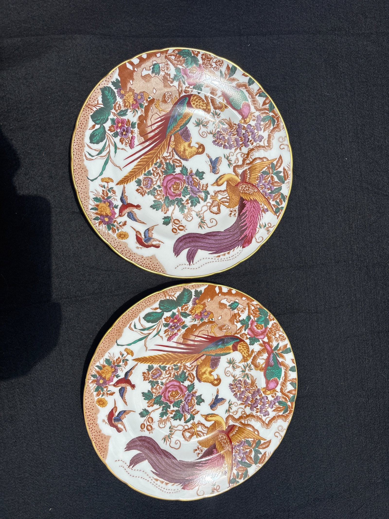 Two Royal Crown Derby Olde Avesbury 10&1/4 inch plates: One first quality & one second; Olde Avesbury 10&1/4 inch plates, from Royal Crown Derby, a classic design that has been part of their collection since the 1930s. Key FeaturesDesign: Intricate birds a
