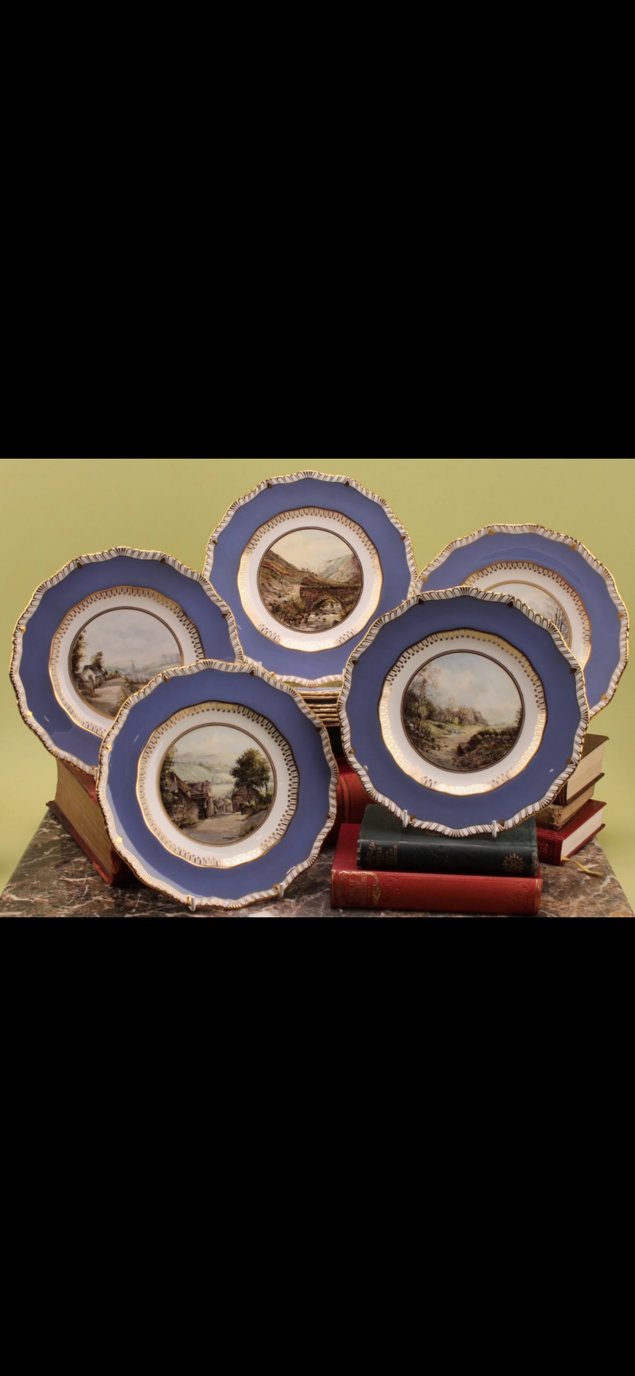 Fabulous twelve Michael Crawley painted Royal Crown Derby shaped circular plates: set of twelve Royal Crown Derby shaped circular plates, painted by Michael Crawley, signed, each painted with Derbyshire landscapes, Nether Bridge, Stoney Middleton, Stanton Moor, Dove Dale, Edale Hea