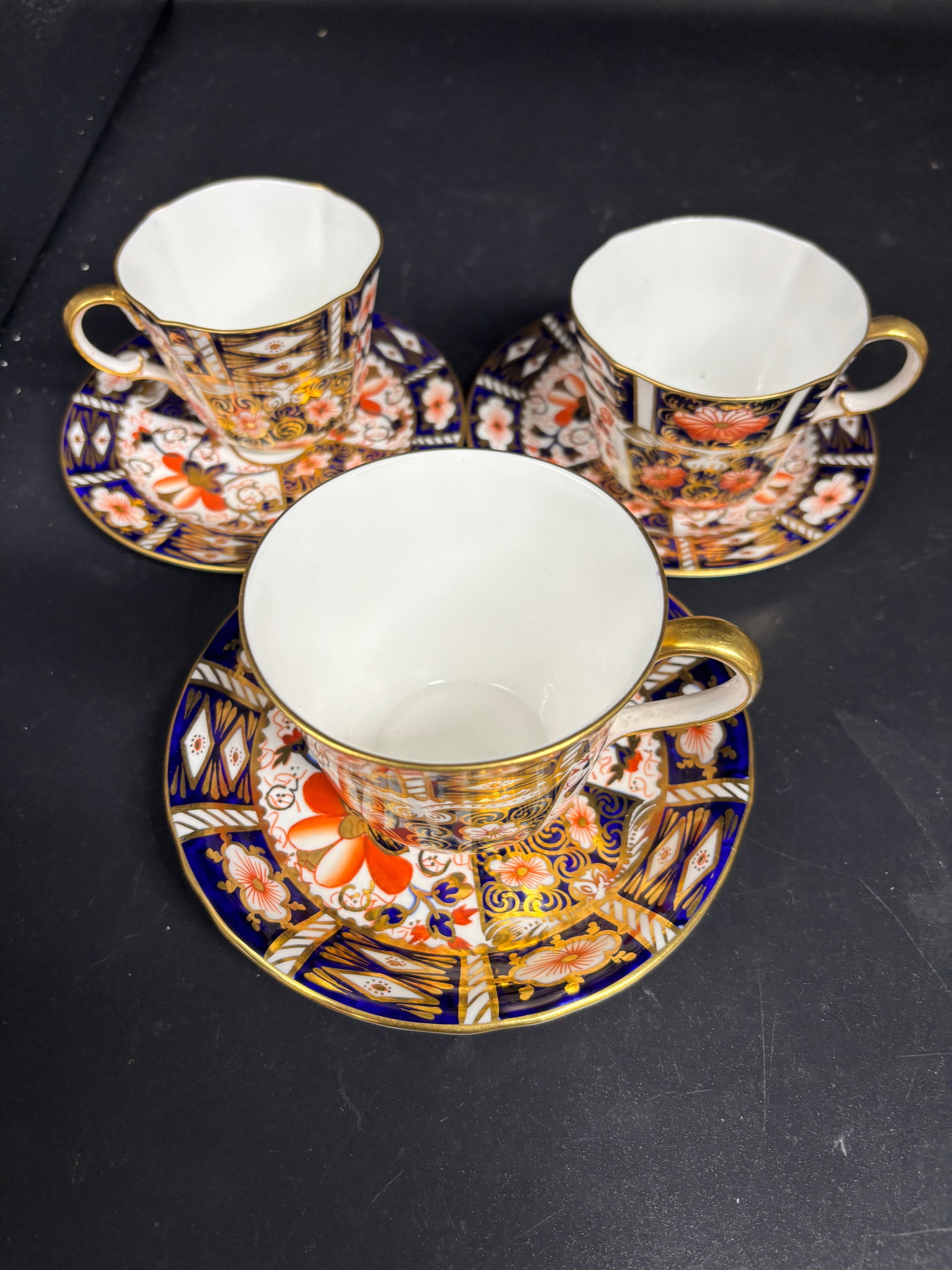 Three similar Royal Crown Derby Imari Pattern 2451 tea cups and saucers (1 of 8)