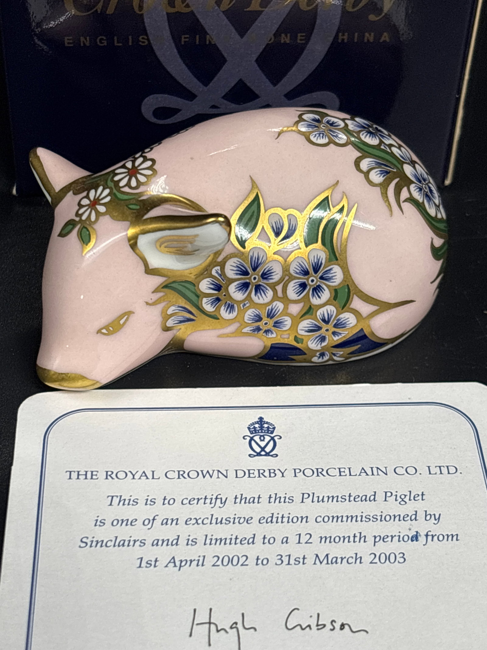 Sinclairs exclusive Royal Crown Derby Plumstead Piglet bone china paperweight: Sinclairs exclusive Royal Crown Derby Plumstead Piglet porcelain paperweight.This figurine was part of an exclusive edition commissioned by Sinclairs and was limited to a one-year production period fr