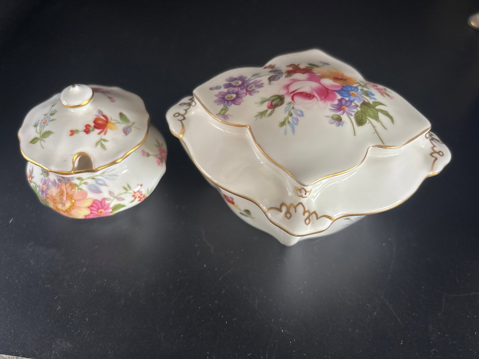 Two ‘Derby Posies’ Royal Crown Derby fine bone china pieces: Two Derby Posies including an unusual vintage Royal Crown Derby diamond shape lidded porcelain trinket box and a condiment hard. It features the classic "Derby Posies" floral design, which highlights 