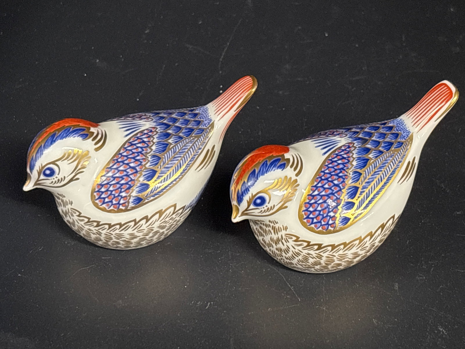 Two ‘Goldcrest’ Royal Crown Derby Imari bone china paperweights: One Gold stopper , one no stopper , no boxes. Royal Crown Derby Imari porcelain bird figurine.These figurines often feature intricate cobalt blue, rust-red, and gold colored patterns.They were produce