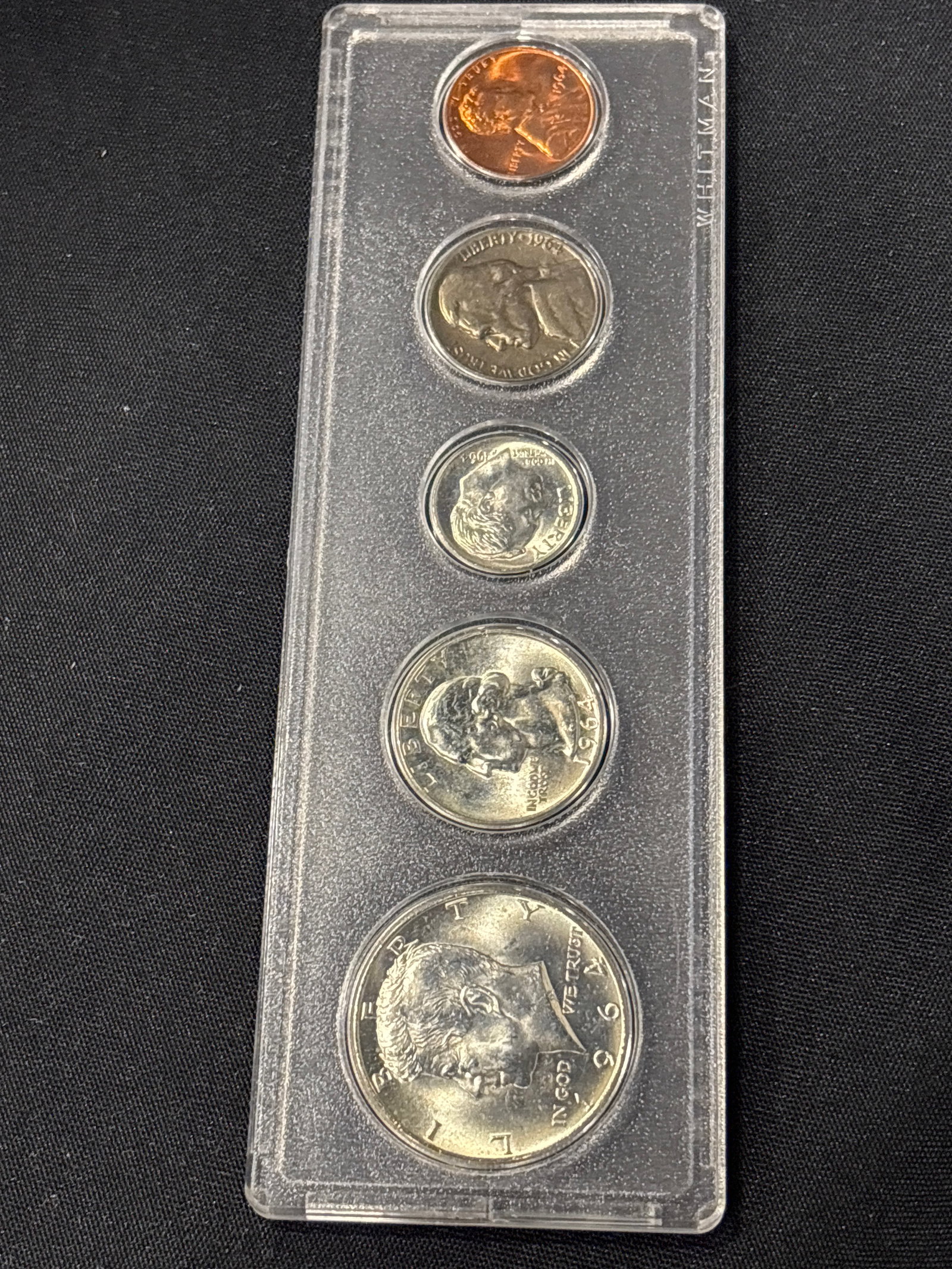 1964 United States Proof five coin Set: 1964 United States Proof Set (or Uncirculated Set) consisting of five coins housed in a protective hard plastic Whitman case.highly valued by collectors because 1964 was the final year that circulatin