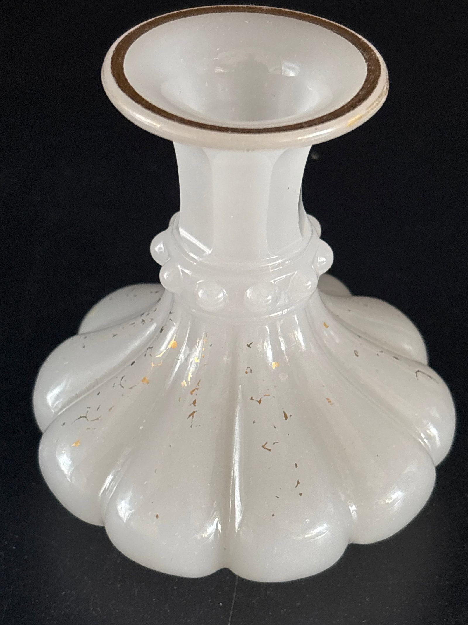 19th C. opaline art glass perfume bottle, no stopper: 19th C. opaline white art glass perfume bottle, likely featuring a "melon" or ribbed design and a gold-trimmed rim, Material: White milk glass. Design: Melon-shaped or ribbed body with a narrow neck. 