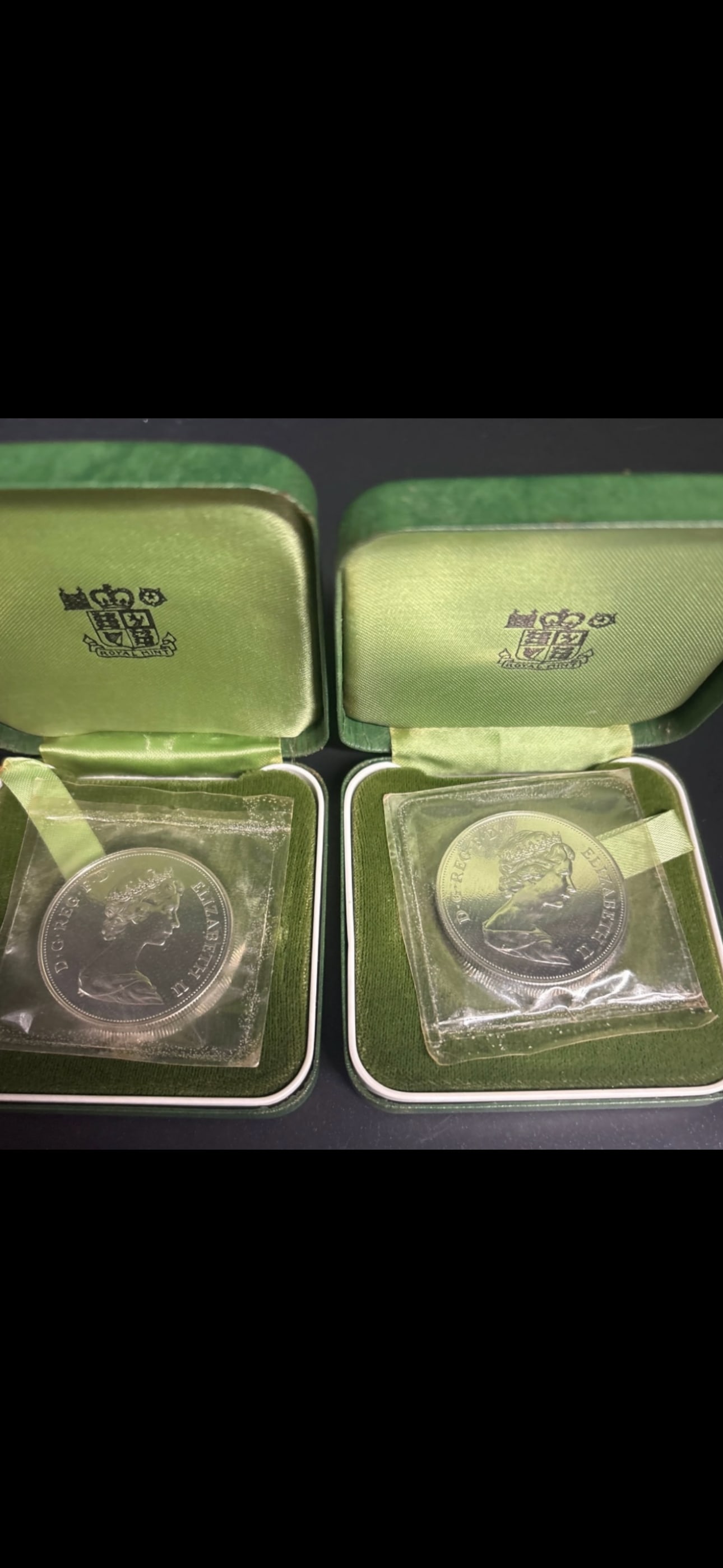 Two .925 sterling silver proof coins, commemorative British Crown (25 pence); 56.56 grams: Two commemorative British Crown (25 pence denomination) issued in 1972 to celebrate the 25th (silver) wedding anniversary of Queen Elizabeth II and Prince Philip. Silver Proofs: A limited edition of 1