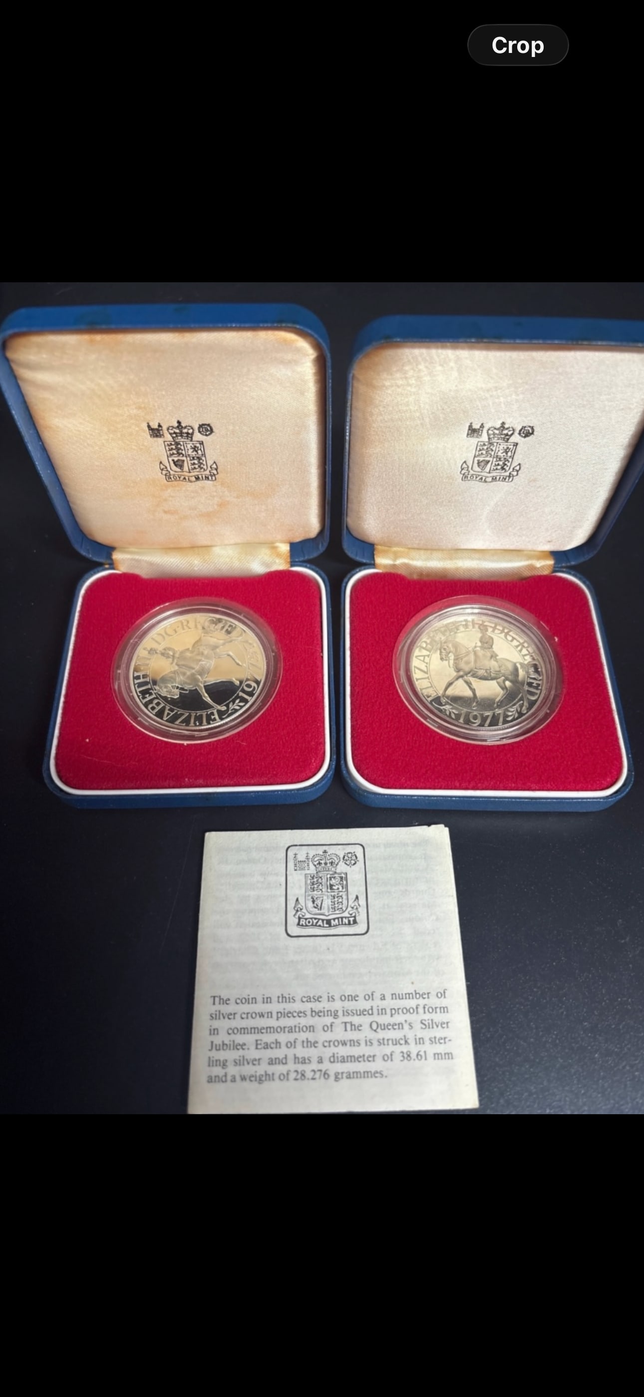Two .925 silver 1977 Queen Elizabeth II Silver Jubilee Commemorative Crown coins;56.56 grams: Two .925 silver proof 1977 Queen Elizabeth II Silver Jubilee Commemorative Crown coins. Design: Features an equestrian portrait of Queen Elizabeth II by artist Arnold Machin on the reverse. Material: 