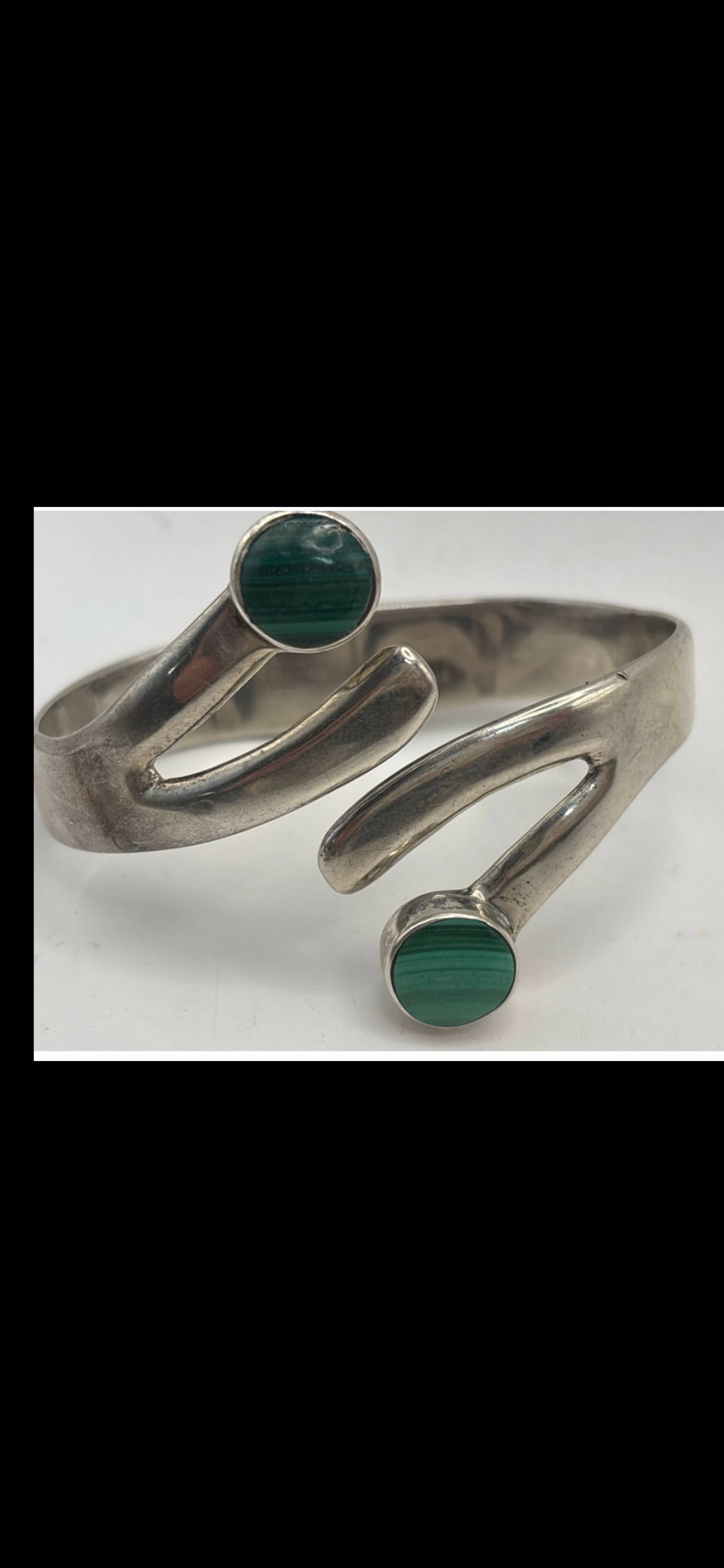 Great Heavy Vintage malachite & sterling silver hinged bracelet; 61grams: Vintage malachite & sterling silver cuff bracelet 61 grams. Hinged opening. Solid and well made.