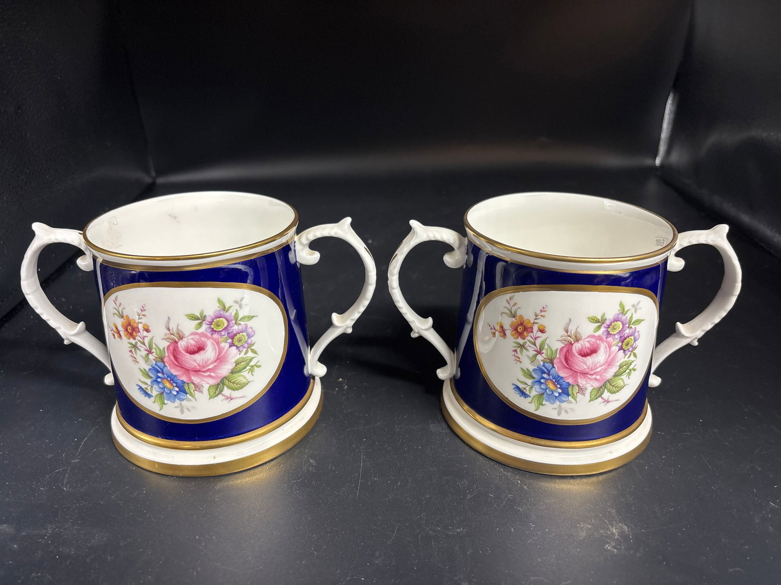 Large Pair Derby Ceramic Art Studios fine English bone china loving cup mugs: Pair Derby Ceramic Art Studios fine English bone china loving cup mugs. two-handled porcelain loving cup, a traditional vessel often used to commemorate special occasions or as a shared drinking cup i
