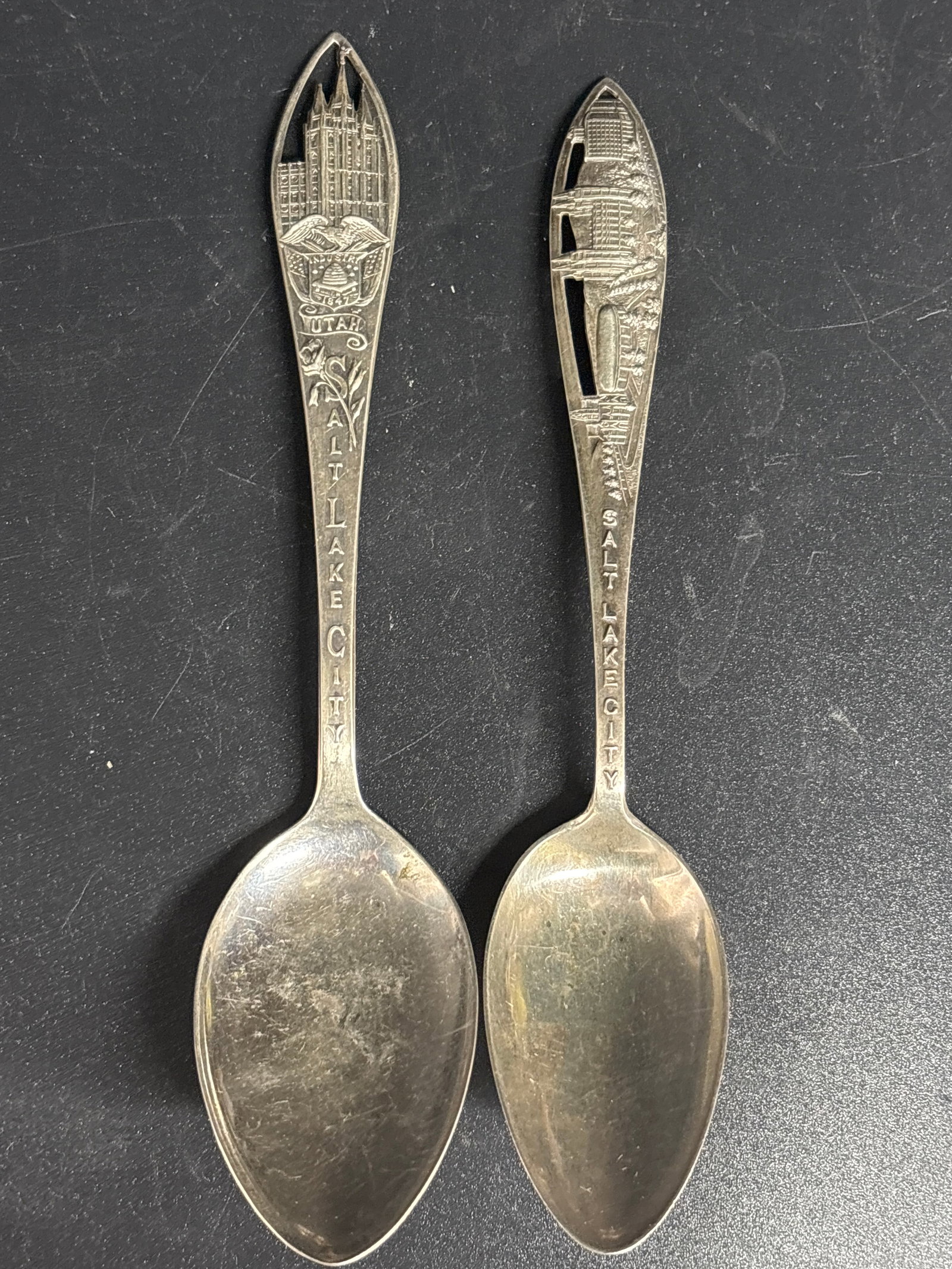 Two sterling silver Salt Lake City souvenir spoons; 35 grams: Two sterling silver Salt Lake City souvenir spoons. 5&1/2 & 5&1/2 inches. 35 grams