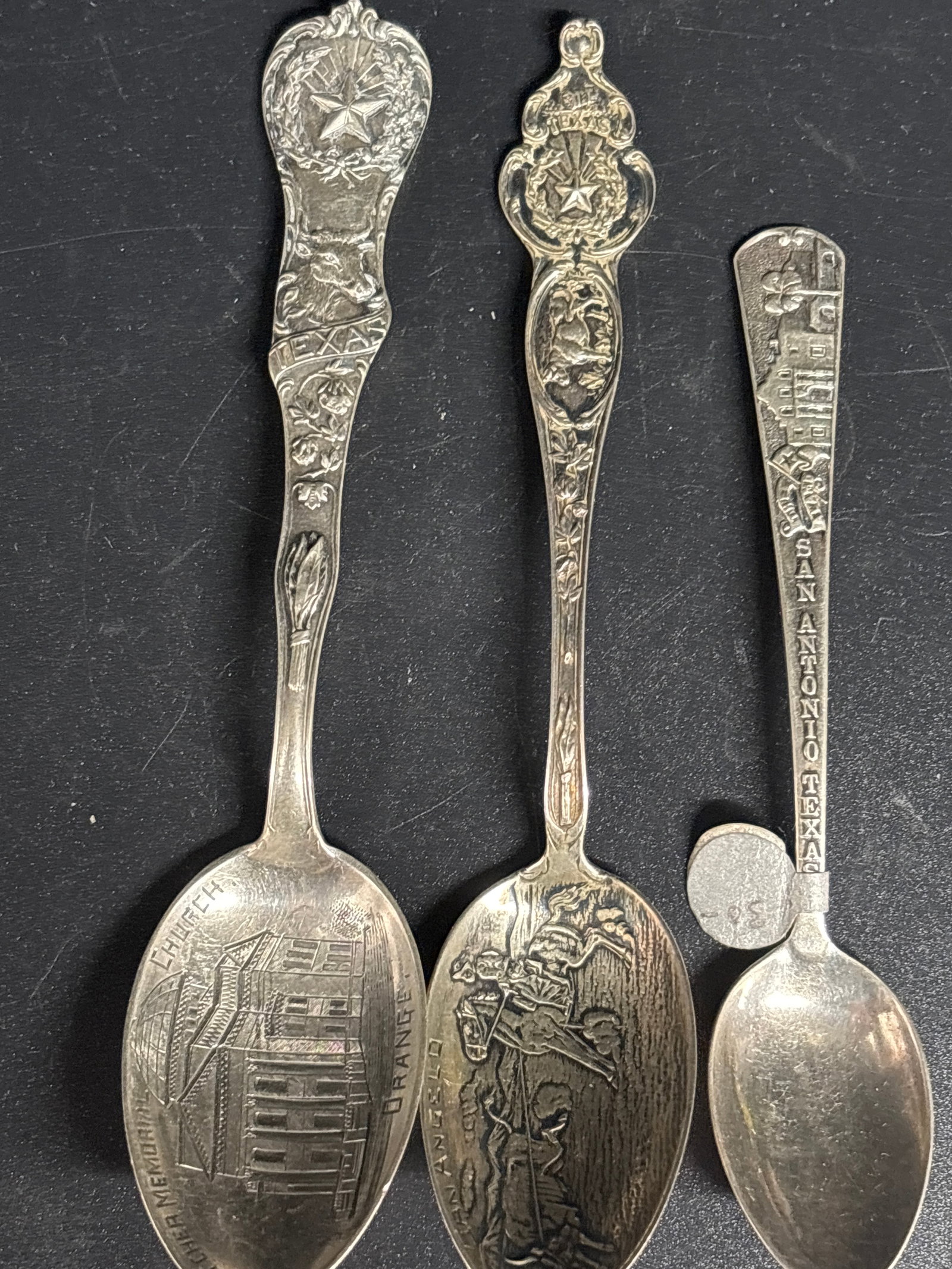 Three sterling silver Texas souvenir spoons; 44 grams: Three sterling silver Texas souvenir spoons. 5&1/2, 5&1/4 & 5 inches. 44 grams