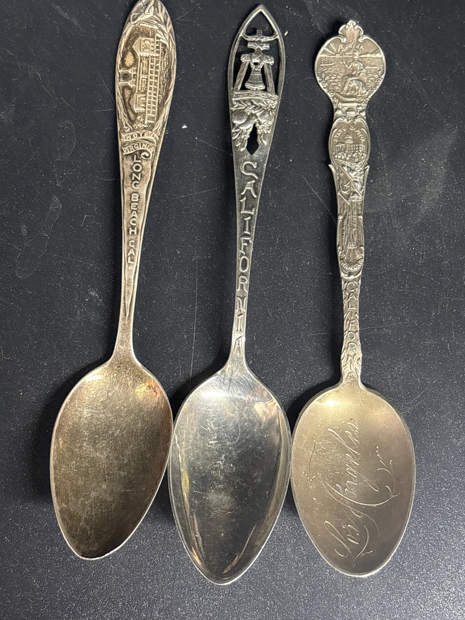 Three sterling silver California souvenir spoons; 51 grams: Three sterling silver California souvenir spoons. 5&1/2 inches. 51 grams