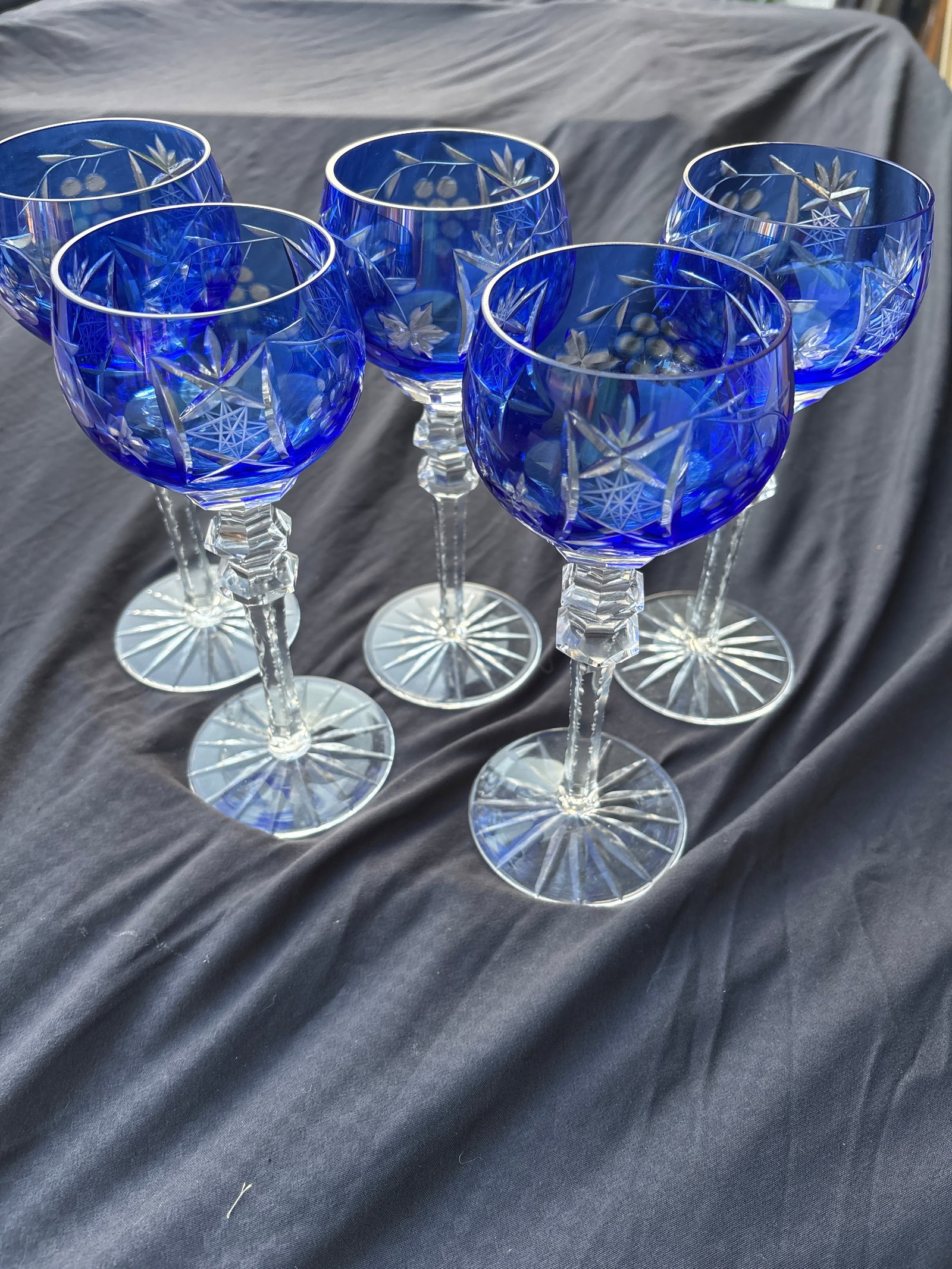 Five tall Godinger glass vintage cobalt blue cut-to-clear crystal 8&1/4 inch wine hocks: Set of five unsigned Godinger glass vintage cobalt blue cut-to-clear crystal 8&1/4 inch wine hock, likely from the Godinger collection Bohemian style produced by companies like Godinger or Crystal Cle